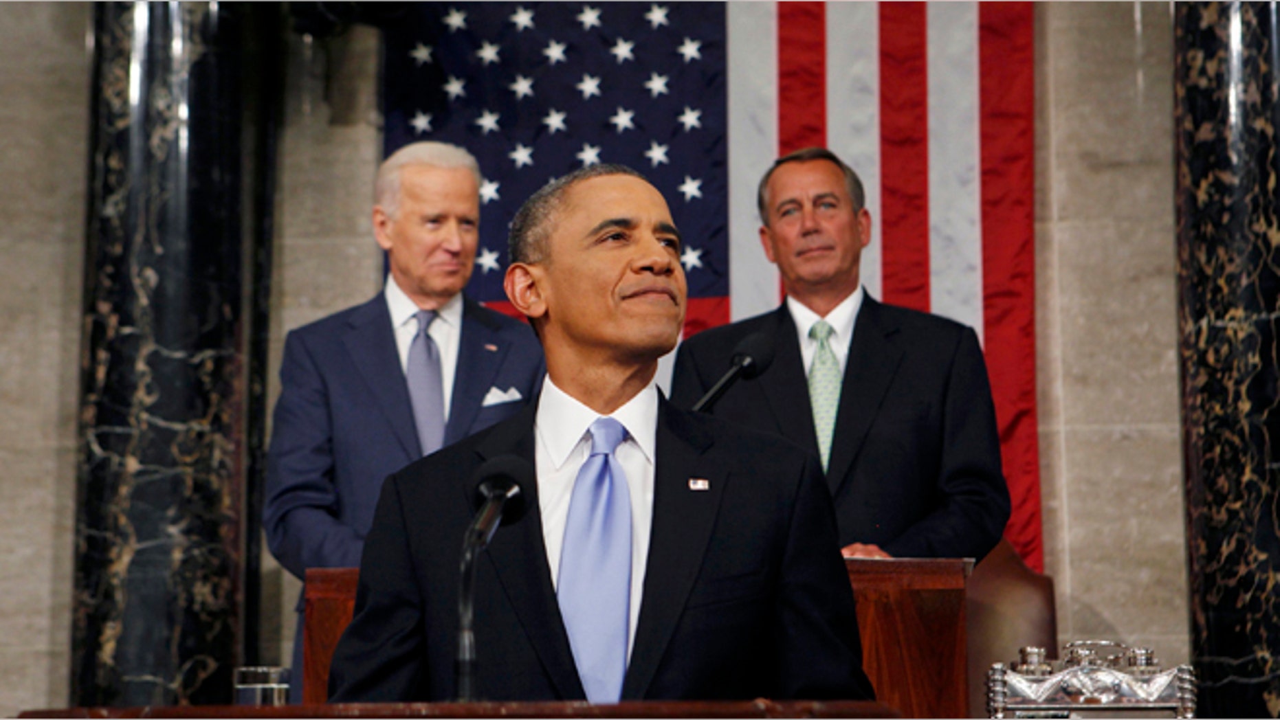 U.S. President Barack Obama smiles as he arrives to deliver his State of the Union speech on Capitol Hill in Washington January 28, 2014.