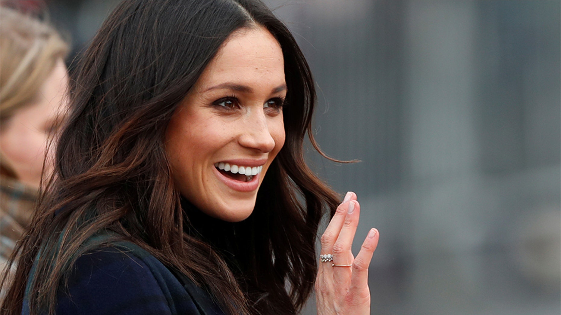 Meghan Markle, fiancee of Britain's Prince Harry, waves as she arrives for a visit to Edinburgh, Scotland February 13, 2018.