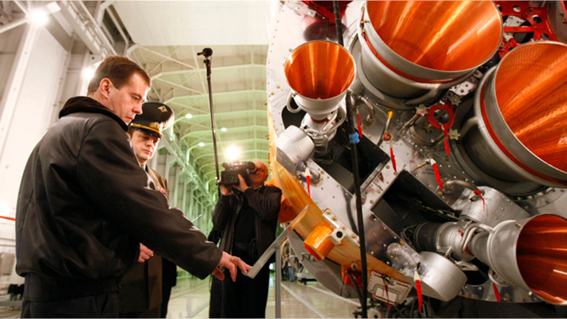 Russian Prime Minister Dmitry Medvedev (L) visits Plesetsk cosmodrome in northern Russia, October 11, 2008.
