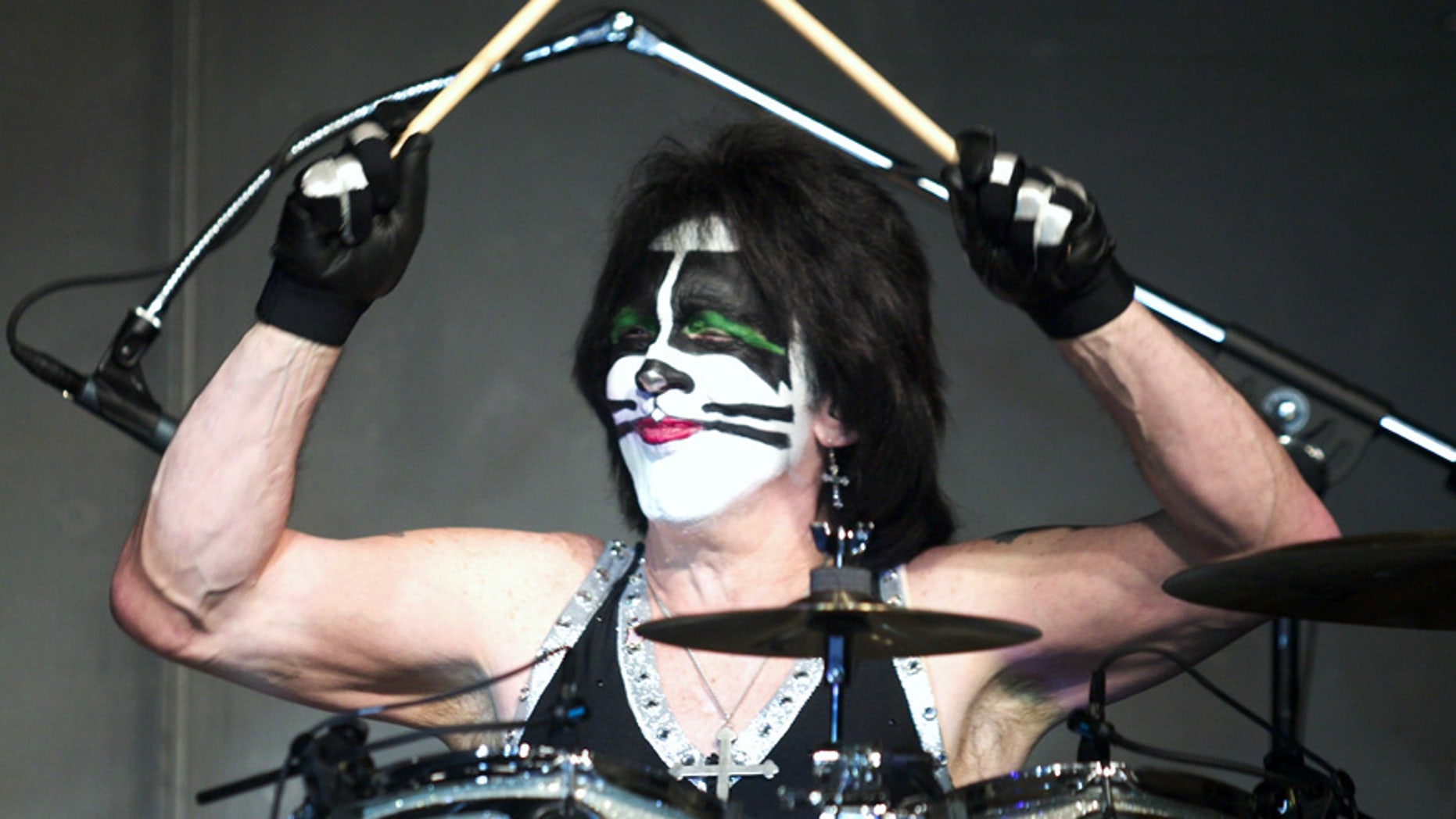 Kiss drummer Peter Criss performs during a sold-out show at the Rain in the Desert nightclub inside the Palms Resort Casino in Las Vegas, Nevada, March 16, 2003.