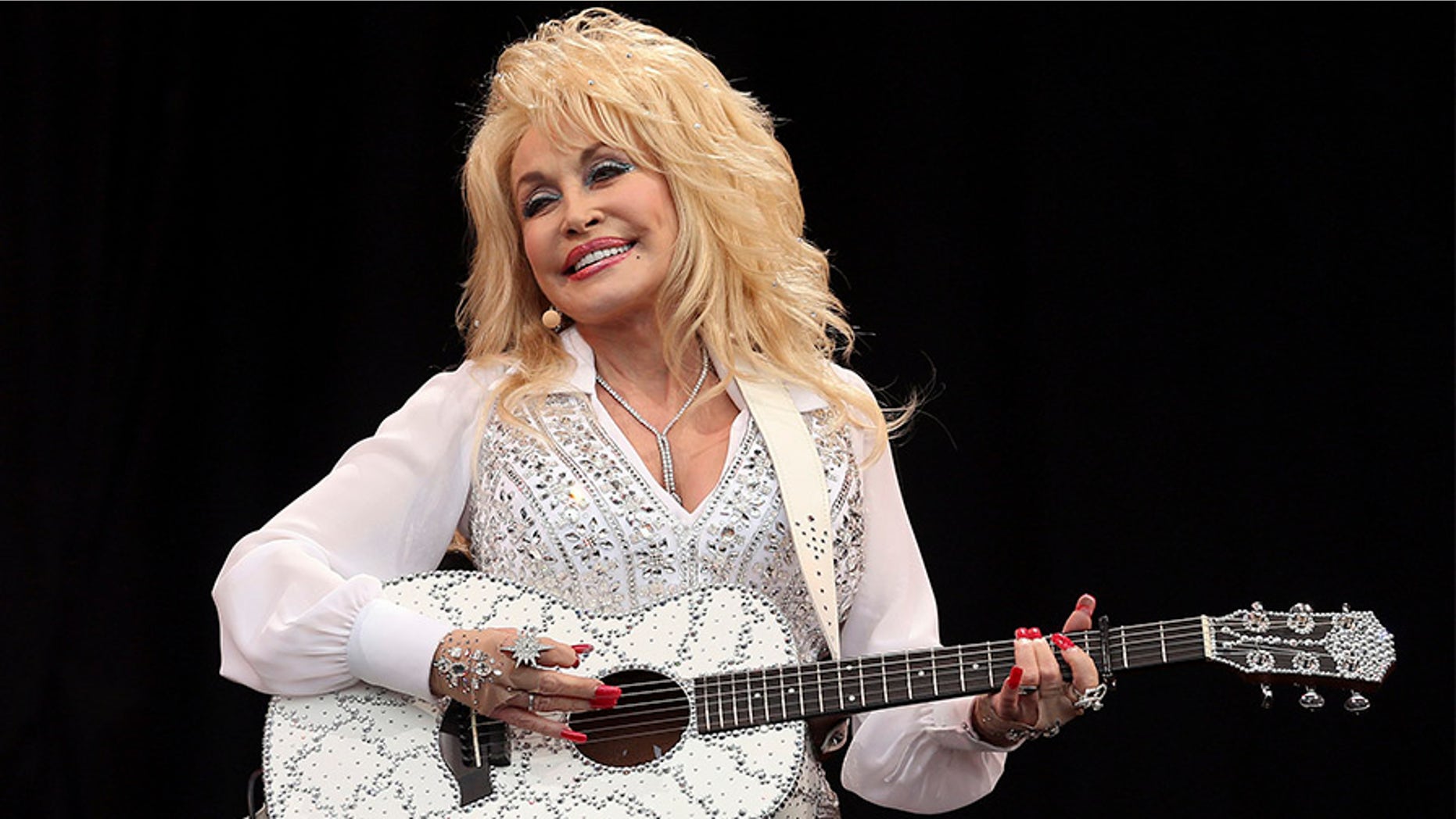 Country superstar Dolly Parton said faith is the secret behind her lasting marriage to longtime husband Carl Thomas Dean.