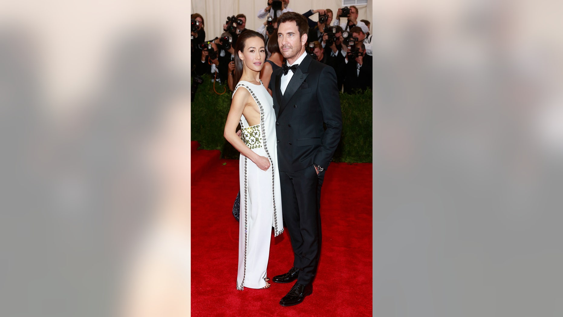 U.S. actors Dylan McDermott and Maggie Q arrive for the Metropolitan Museum of Art Costume Institute Gala 2015 celebrating the opening of "China: Through the Looking Glass," in Manhattan, New York May 4, 2015. REUTERS/Andrew Kelly - RTX1BK7G