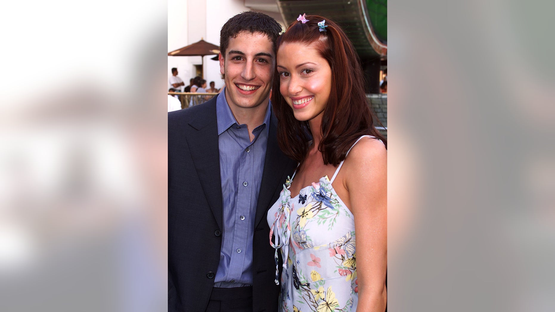 Actors Jason Biggs (L) and Shannon Elizabeth, two of the ensemble cast members of the comedy film "American Pie".