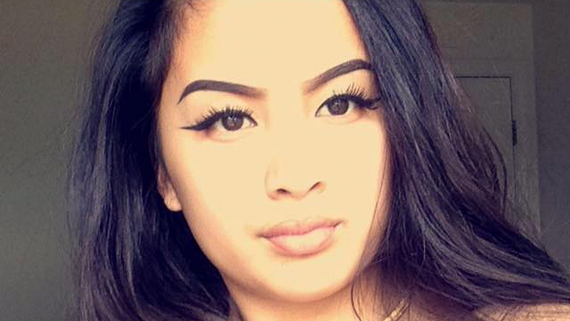 Raelyn Domingo was arrested in connection with a shooting and robbery.