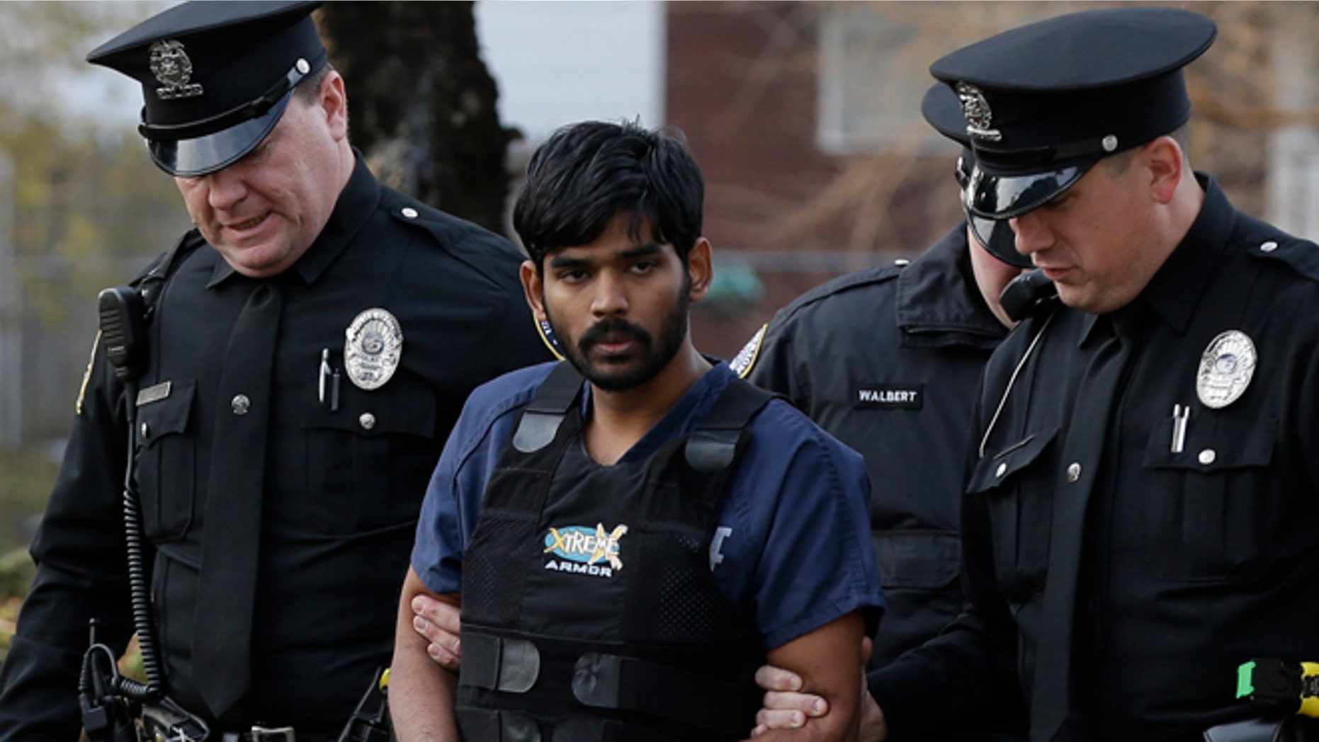 Nov. 28: Raghunandan Yandamuri is escorted to a Montgomery County district court for a preliminary hearing in Bridgeport, Pa.