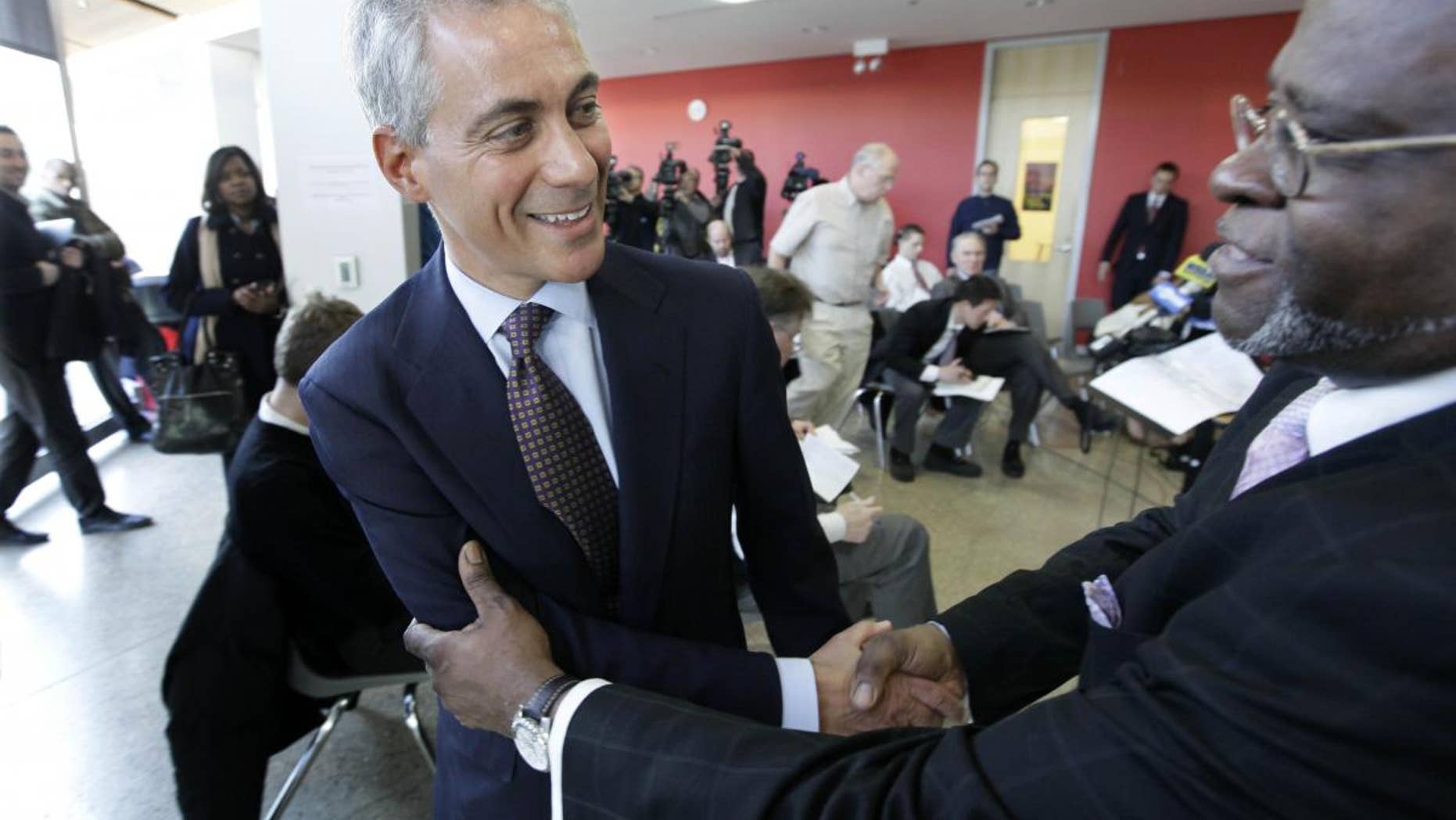 Chicago mayoral candidate Rahm Emanuel shakes hands after speaking at a news conference at the Better Boys Foundation, Tuesday, Jan. 4, 2011, in Chicago. (AP Photo/M. Spencer Green)