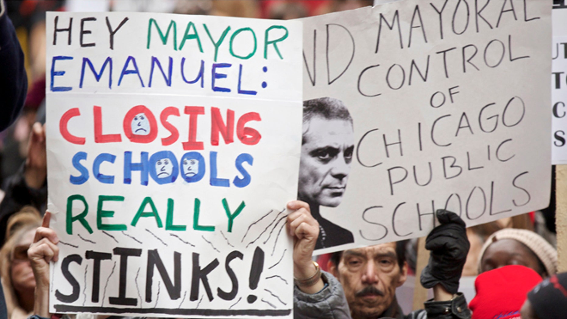 FILE: March 27, 2013: Chicago Teachers Union members protest the city's plan to close 54 public schools, in downtown Chicago, Ill.