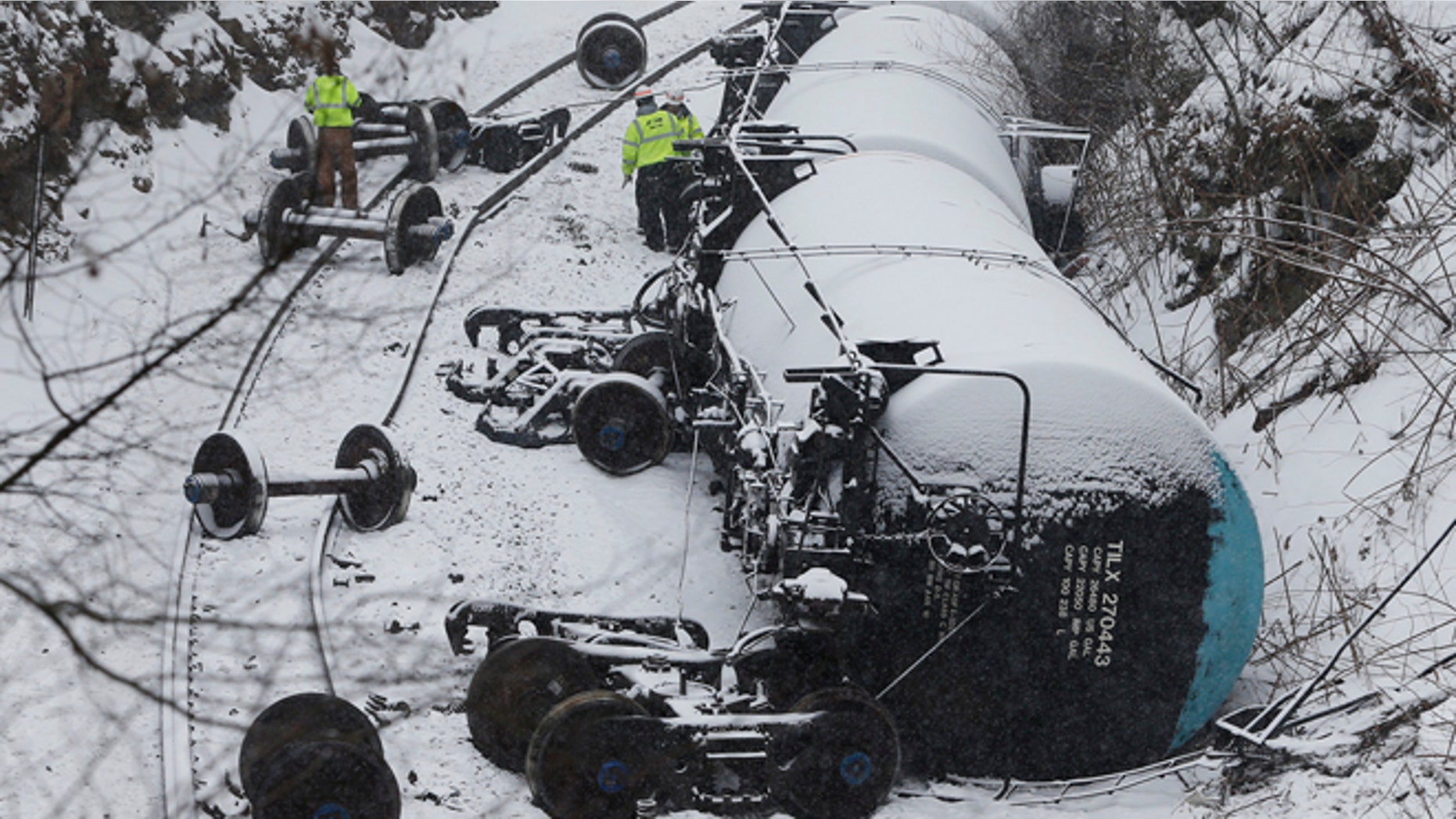 Feb. 13: Emergency personnel examine the wreckage of a train derailment near Vandergrift, Pennsylvania. A 120-car Norfolk Southern Corp train carrying heavy Canadian crude oil derailed and spilled in western Pennsylvania on Thursday, adding to a string of recent accidents that have prompted calls for stronger safety standards.