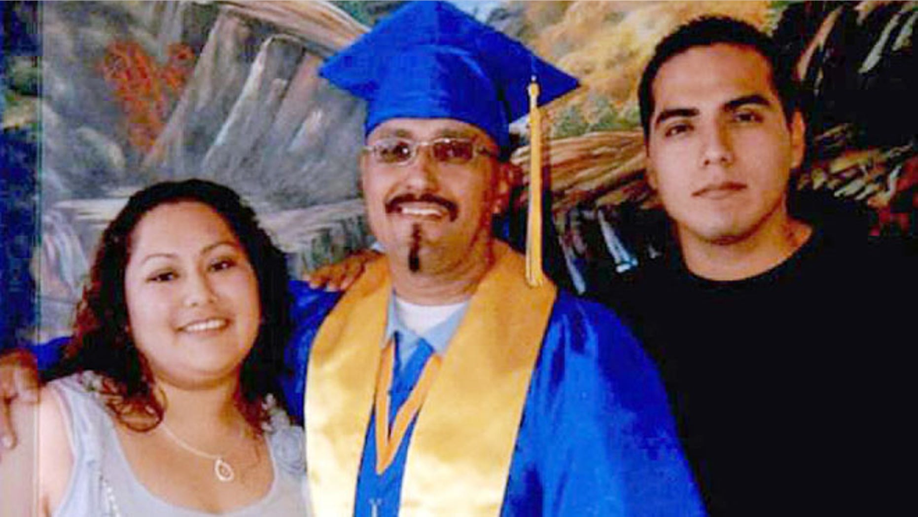 This December 2013 photo provided by the California Innocence Project shows Luis Vargas, center, with his daughter Crystal Vargas and son Daniel Vargas.