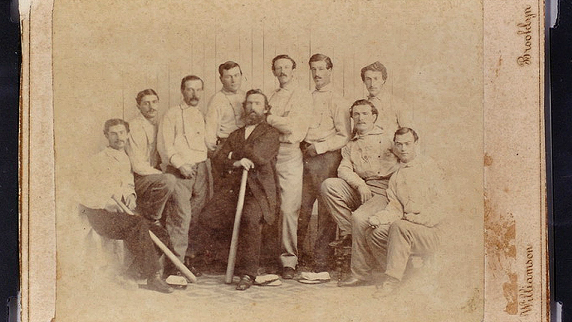 Jan 9, 2013: This photo released by the Saco River Auction Co., in Biddeford, Maine, shows a rare 1865 baseball card of the Brooklyn Atlantics, discovered in a photo album bought at a yard sale in Baileyville, Maine, on the Canadian border
