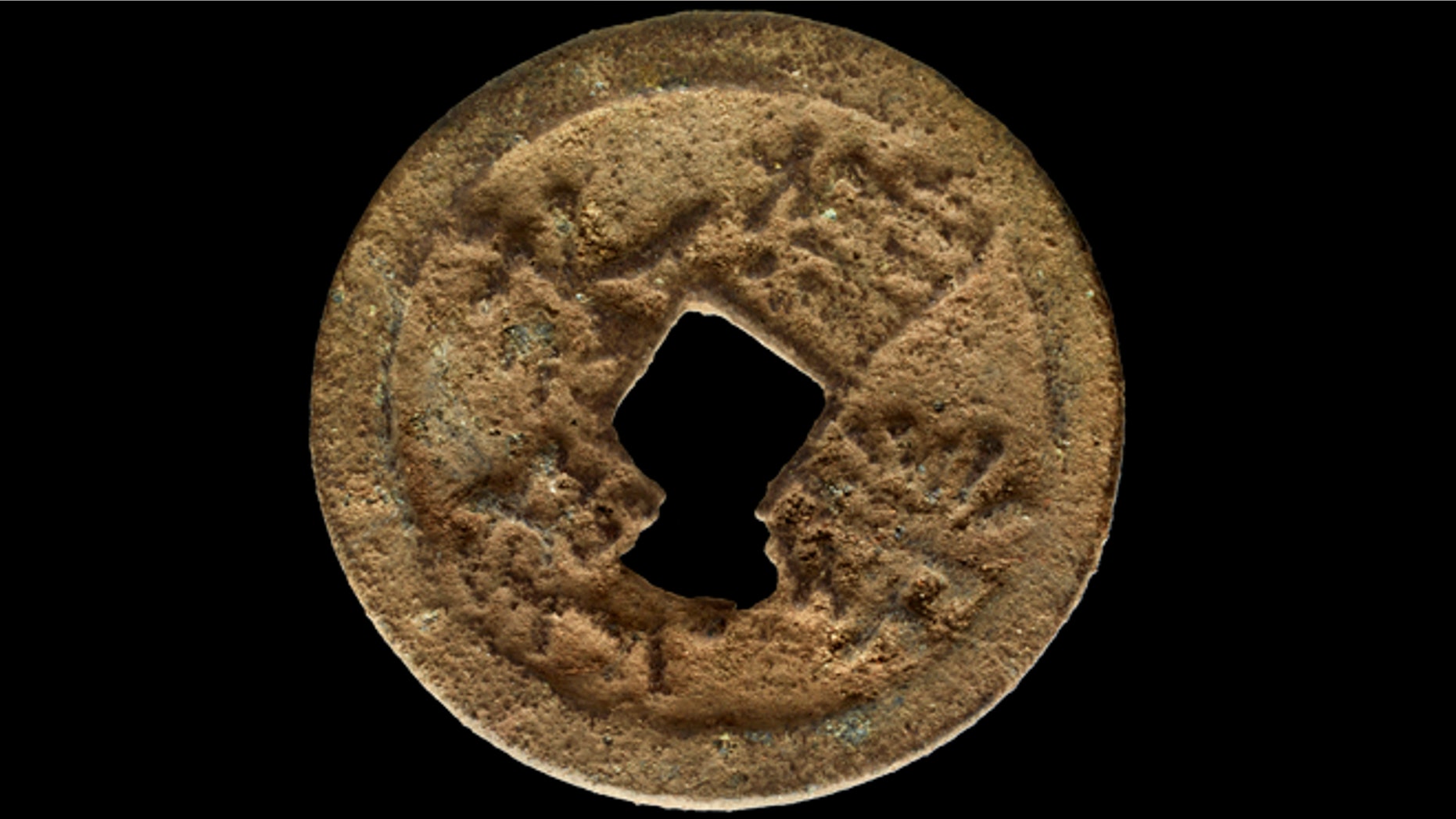 Feb. 8, 2013: A rare, 600-year-old Chinese coin that scientists from Illinois discovered on the Kenyan island of Manda. The museum announced the discovery Wednesday, March 13.