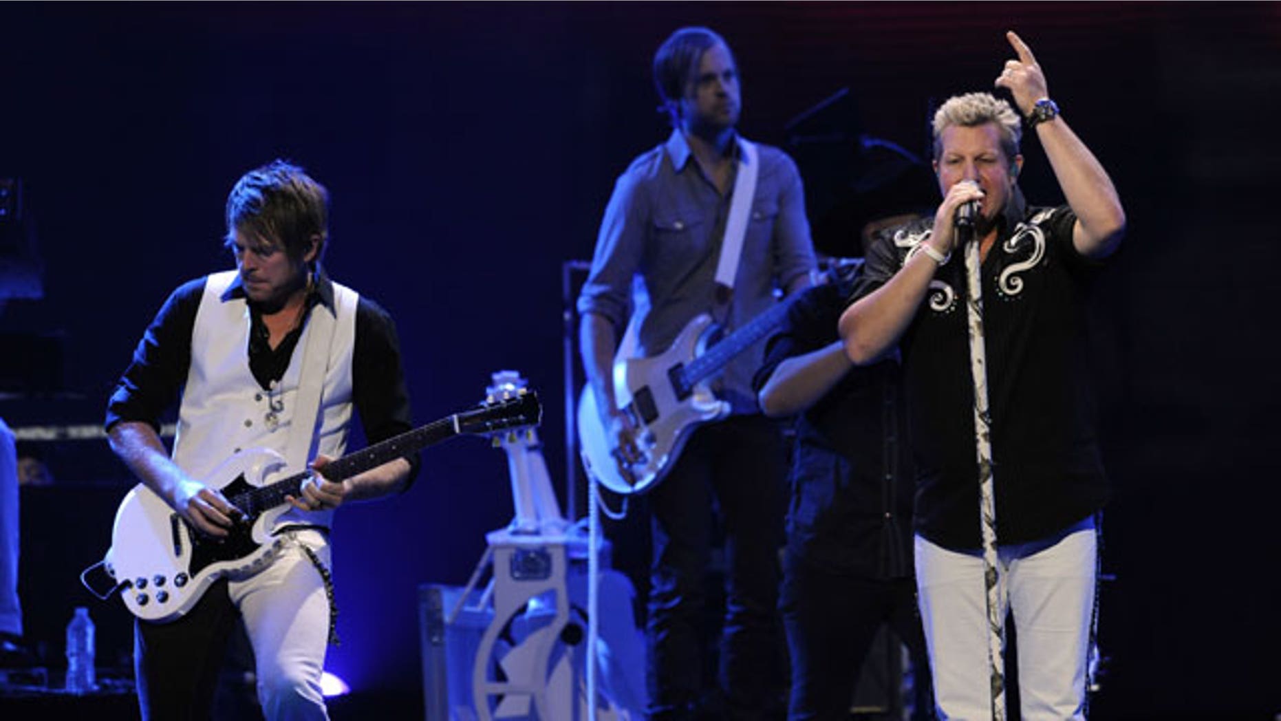 September 24: Gary LeVox, right, and Joe Don Rooney, left, of the band Rascal Flatts perform during the iHeartRadio music festival in Las Vegas.