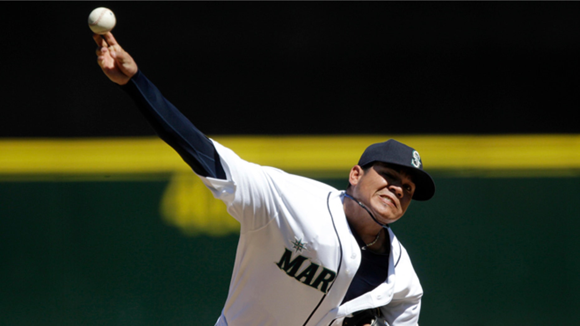Seattle Mariners starting pitcher Felix Hernandez throws to a Tampa Bay Rays batter in the fourth inning of a baseball game, Wednesday, Aug. 15, 2012, in Seattle. (AP Photo/Ted S. Warren)