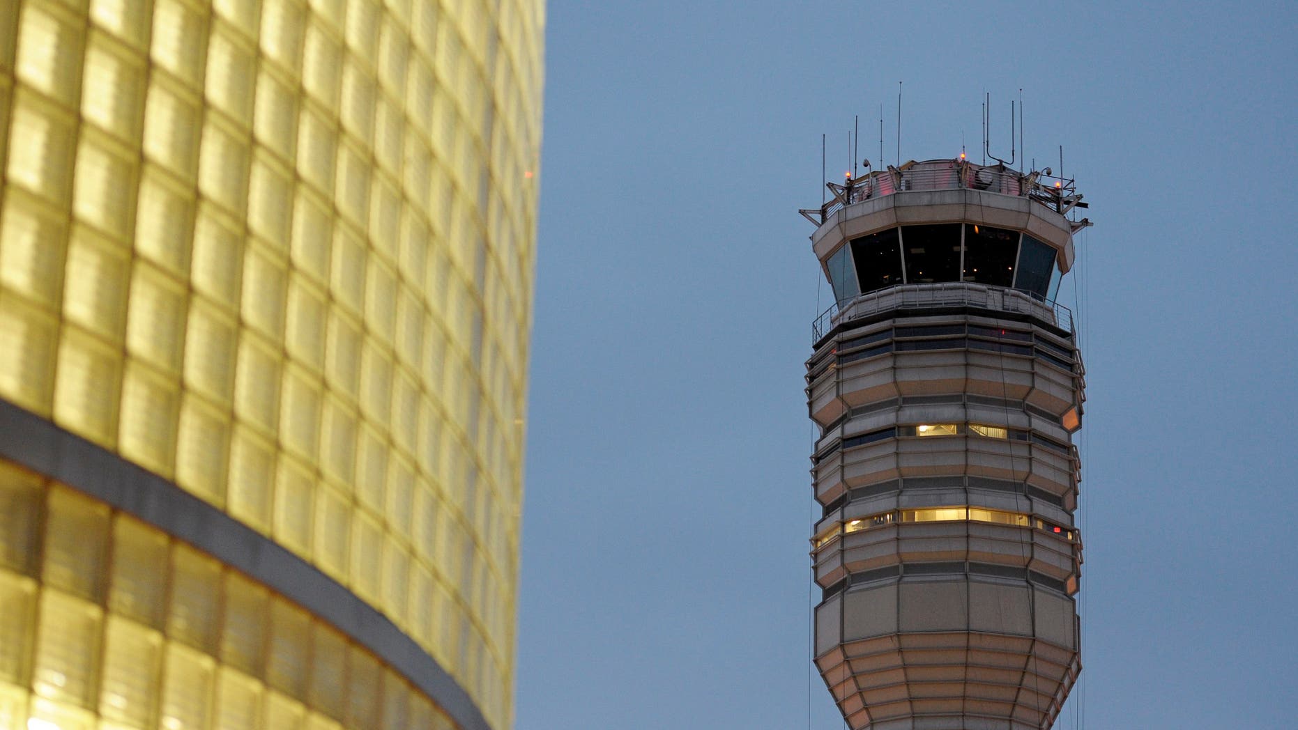 The FAA control tower at Reagan National Airport is seen in Arlington, Wednesday, March 23, 2011. (AP)