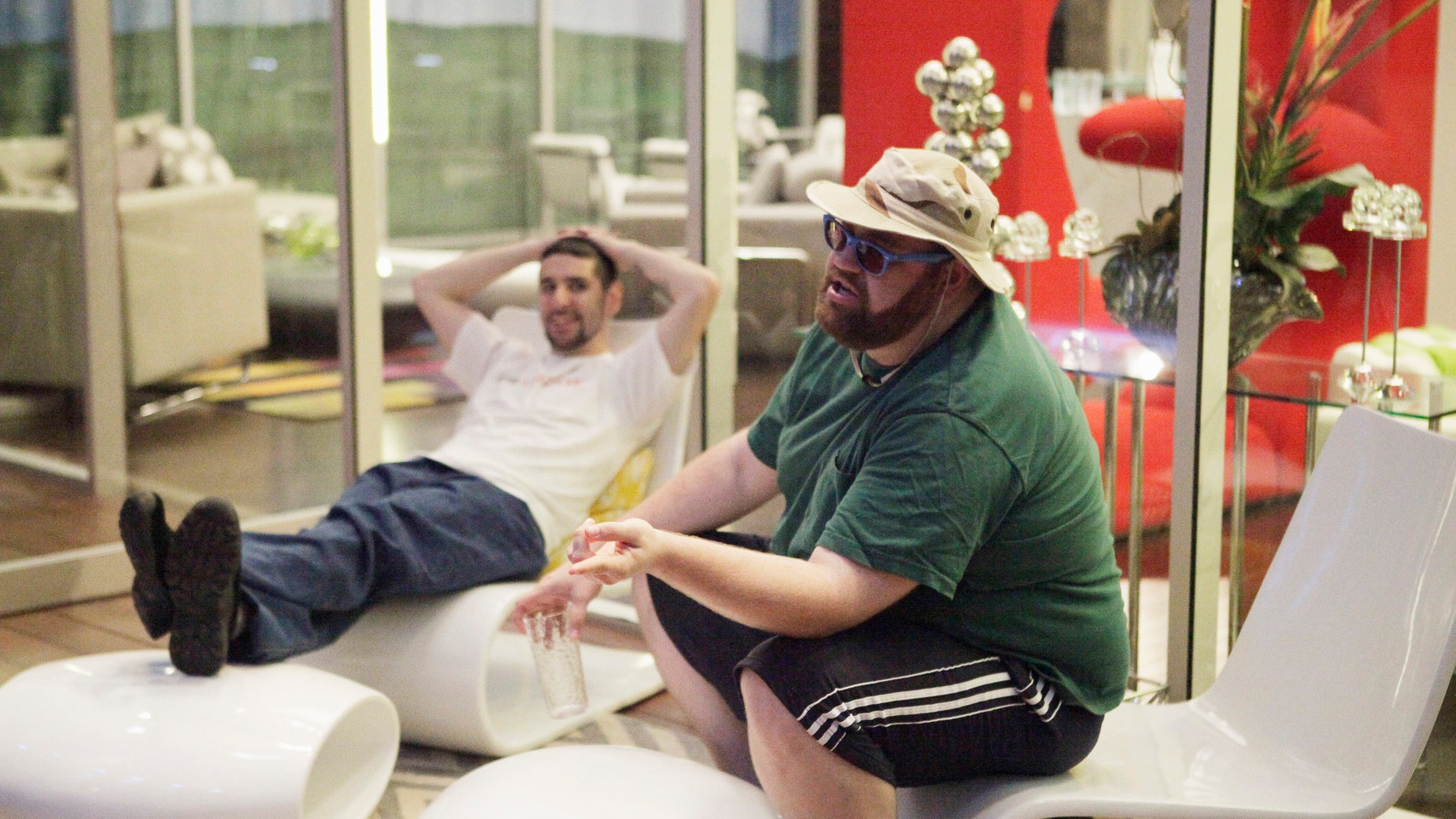 June 18, 2012: In this file photo released by ABC shows contestants Apollo, left, and Jeffrey during the premiere episode of "The Glass House." The seventh episode of "Glass House" aired Monday, July 30, 2012.