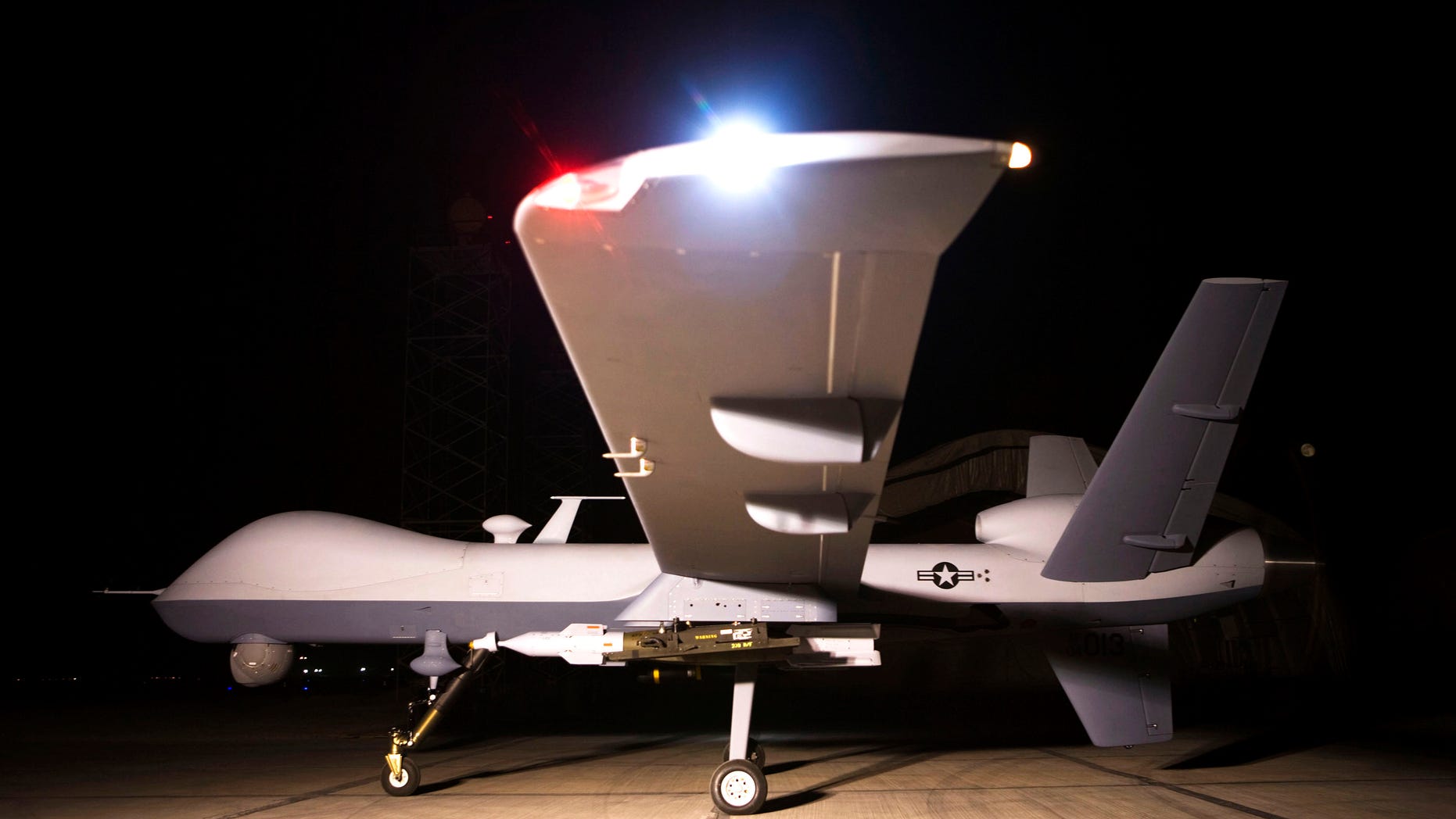 An MQ-9 Reaper sits on a ramp in Afghanistan Sept. 31. The Reaper is launched, recovered and maintained at deployed locations, while being remotely operated by pilots and sensor operators at Creech Air Force Base, Nev.