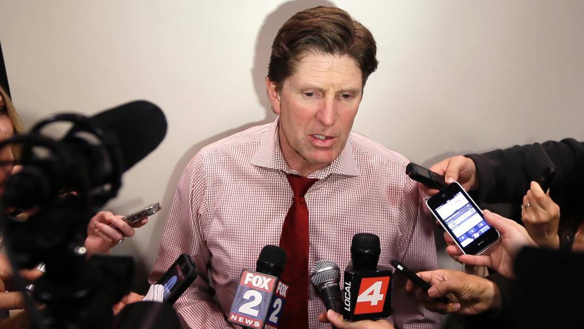 Detroit Red Wings head coach Mike Babcock addresses the media at Joe Louis Arena in Detroit, Tuesday, April 29, 2014. Babcock has one year left on his contract, and signing him to a longer-term deal might be an item on the franchise's list of things to do this offseason. (AP Photo/Carlos Osorio)