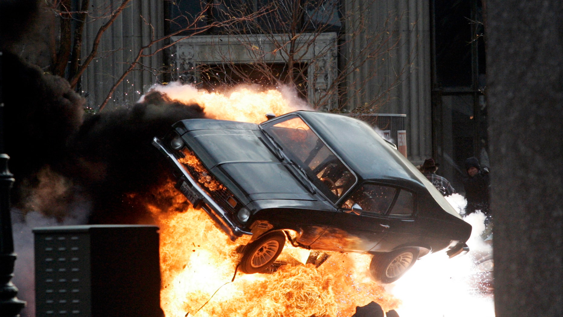 A car blows up on the set of "Red Dawn" in Detroit, Michigan, October 19, 2009. (REUTERS/Rebecca Cook)