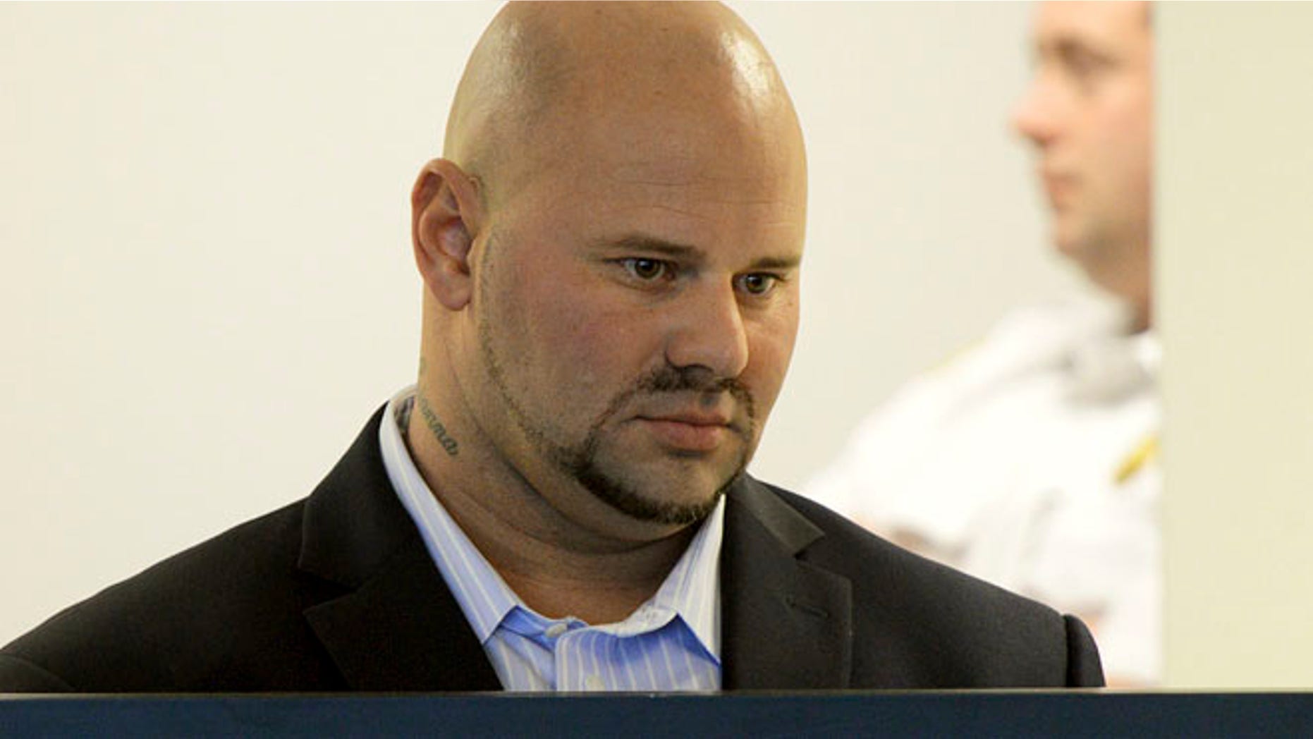Oct. 8: Jared Remy, son of Boston Red Sox broadcaster Jerry Remy, stands during arraignment at Middlesex Superior Court in Woburn, Mass.