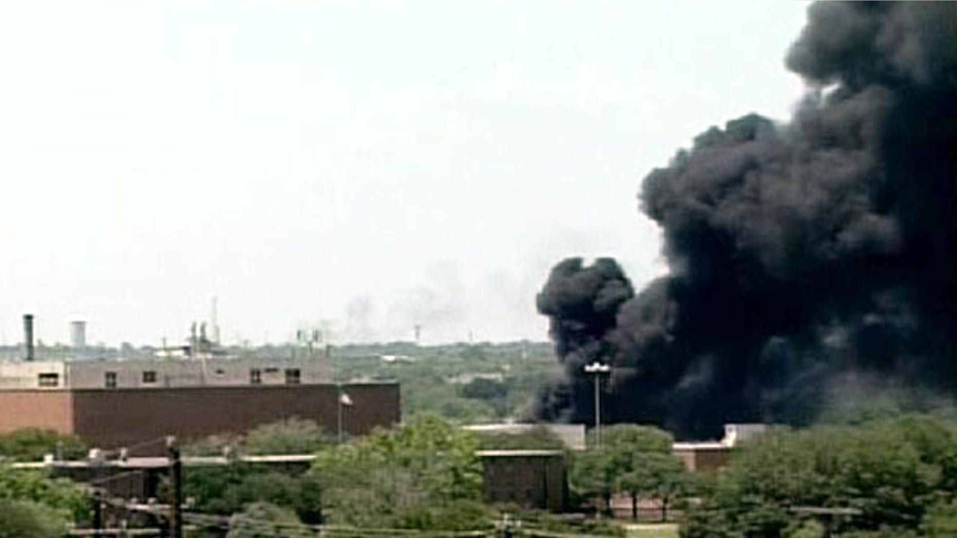 May 5: Plumes of smoke rise over San Antonio after truck exploded at the AGE refinery.