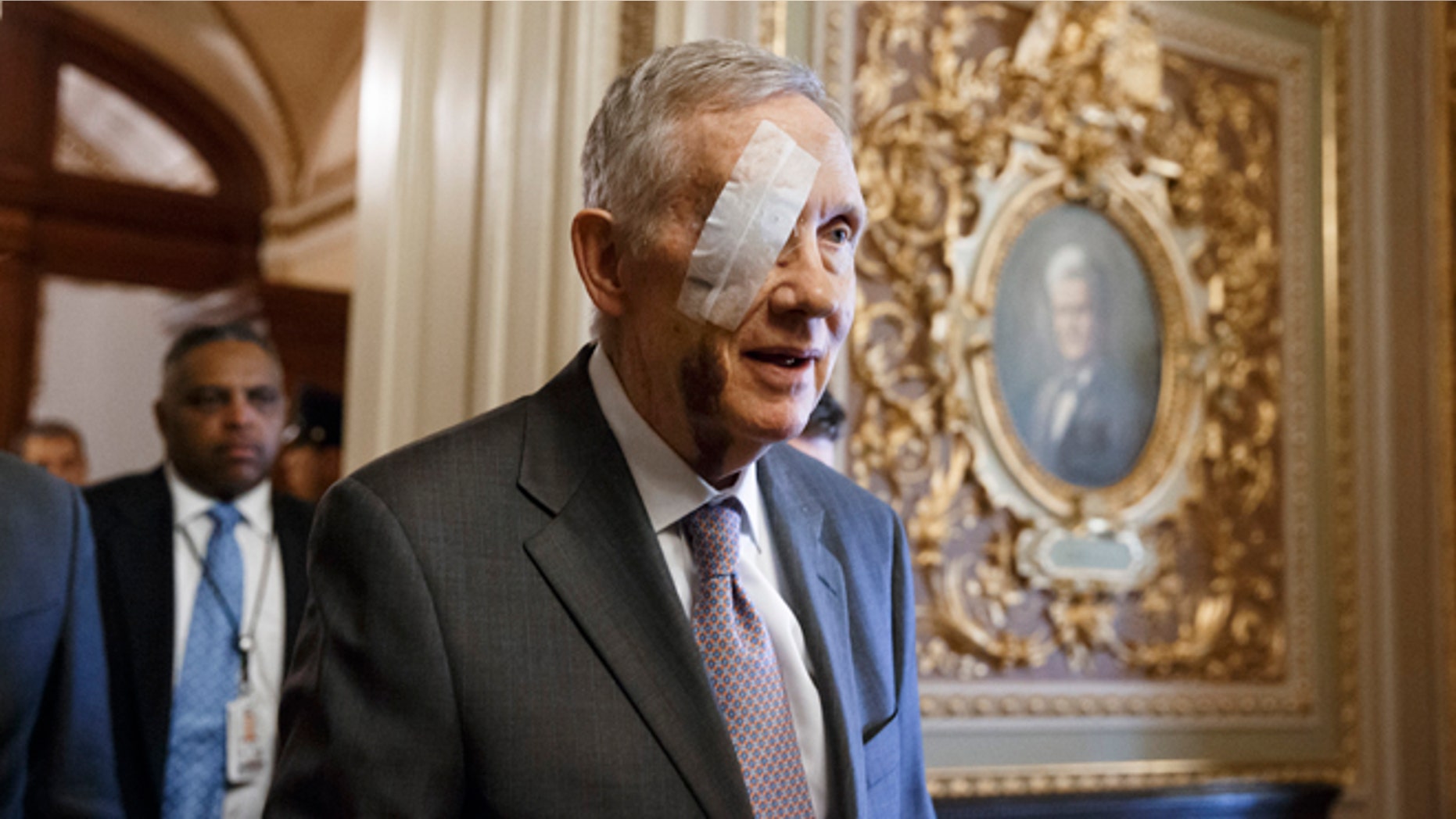 Senate Minority Leader Harry Reid of Nev. returns to Capitol Hill in Washington, Tuesday, Jan. 20, 2015, for the first time since suffering injuries after an exercise accident.