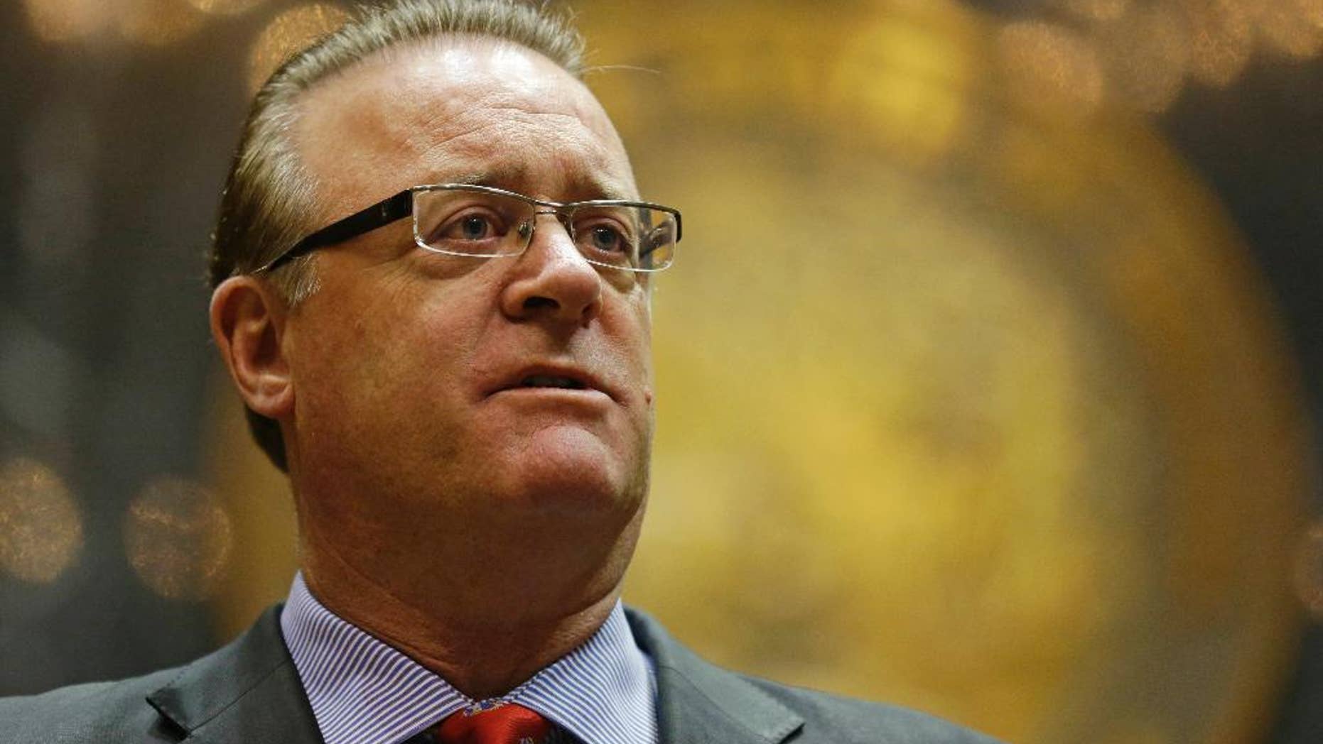 Indiana Senate President Pro Tem David Long announces changes to the state's new religious objections law during a press conference in the House chamber at the Statehouse in Indianapolis, Thursday, April 2, 2015. The measure has faced criticism it could allow discrimination against lesbians and gays. (AP Photo/Michael Conroy)