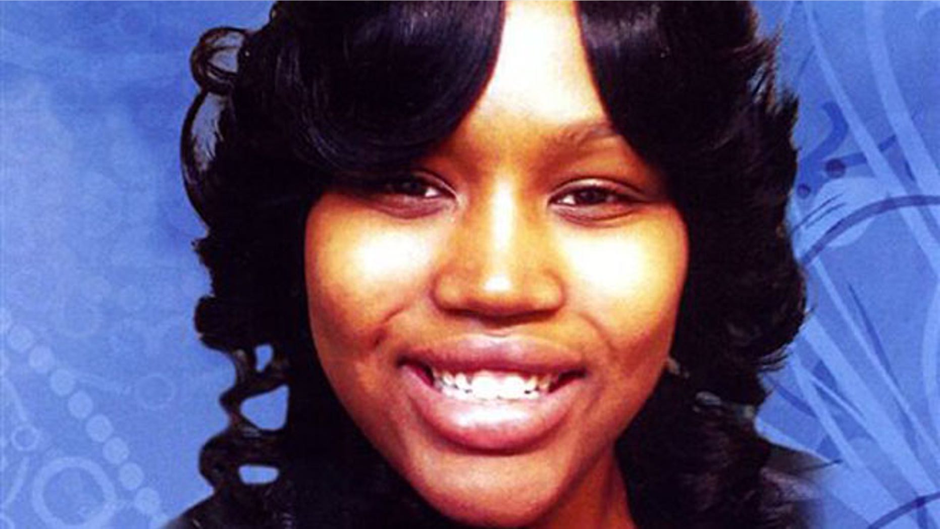 This undated file photo is the cover of a funeral program showing 19-year-old Renisha McBride from a service in Detroit.