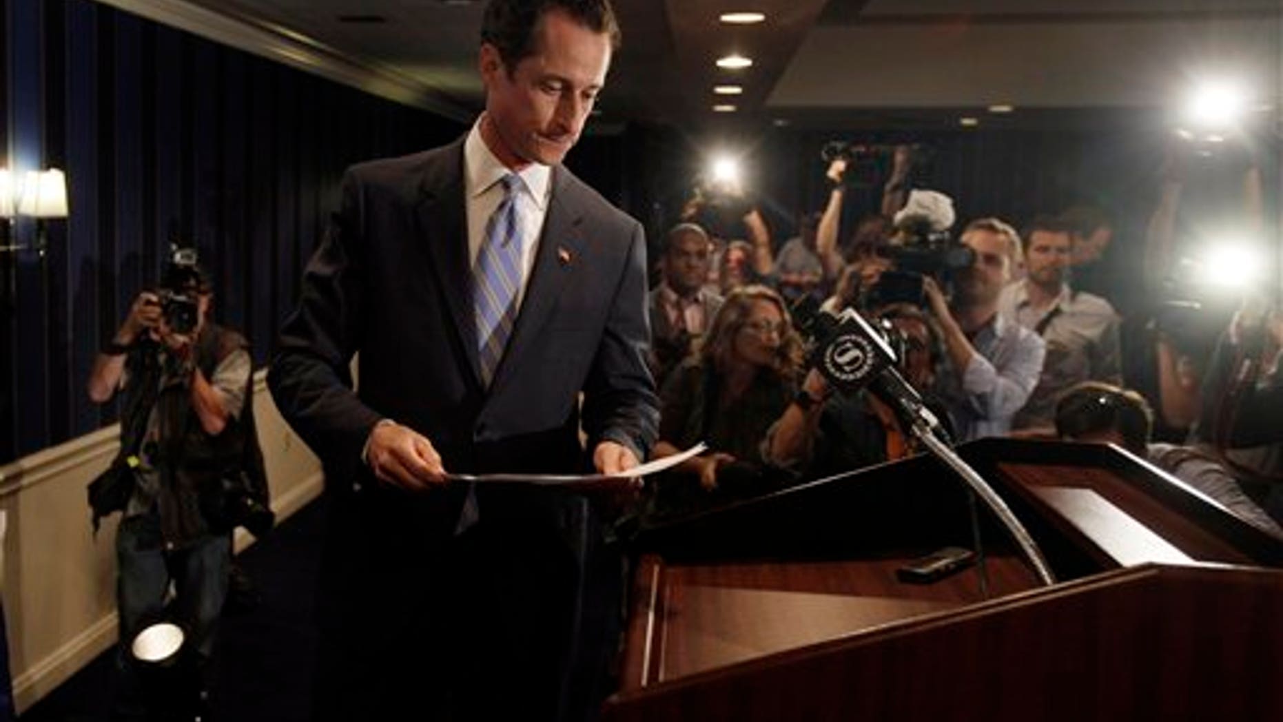 U.S. Rep. Anthony Weiner, D-N.Y., arrives for a news conference in New York, Monday, June 6, 2011. After days of denials, a choked-up New York Democratic Rep. Anthony Weiner confessed Monday that he tweeted a bulging-underpants photo of himself to a young woman and admitted to "inappropriate" exchanges with six women before and after getting married. (AP Photo/Richard Drew)