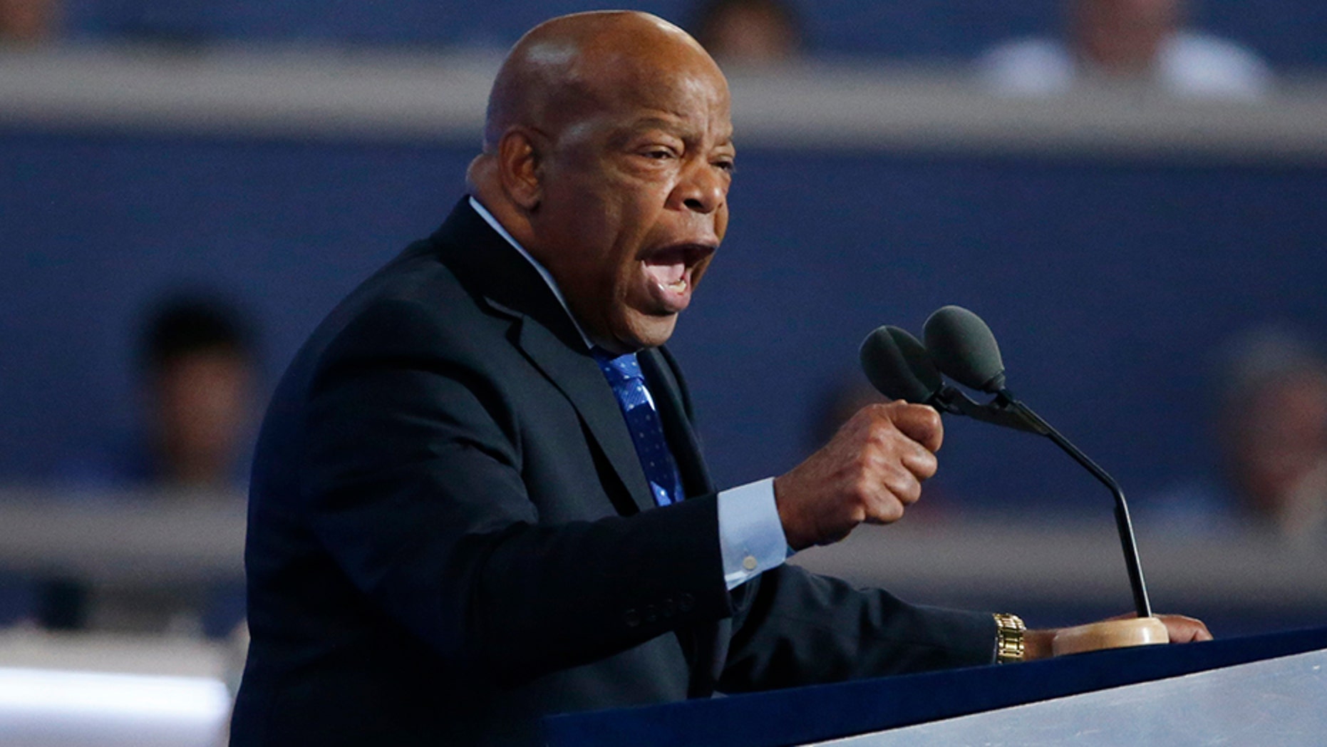 U.S. Rep. John Lewis, D-Ga., gestures as he nominates Hillary Clinton at the Democratic National Convention in Philadelphia, July 26, 2016.