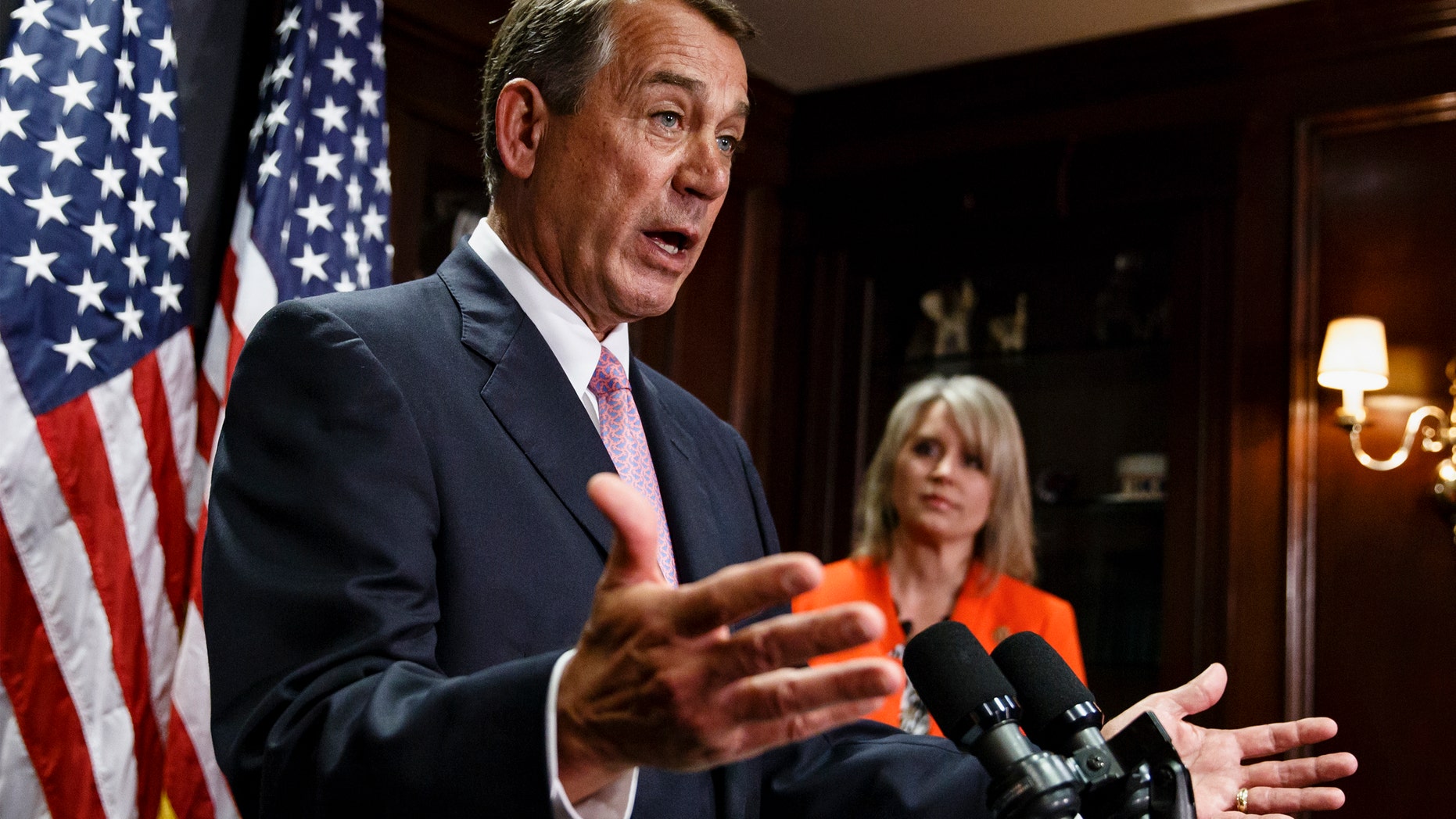 April 29, 2014: House Speaker John Boehner of Ohio, joined by Rep. Renee Ellmers, R-N.C., talks to reporters following a Republican strategy meeting on Capitol Hill in Washington.