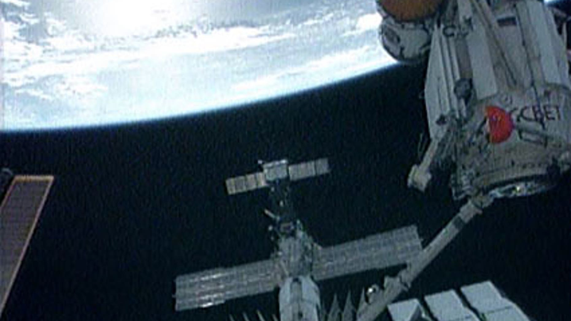 May 18: The International Space Station's robotic arm moves the Russian Mini-Research Module-1, named Rassvet, to its new position on the Russian segment of the station.