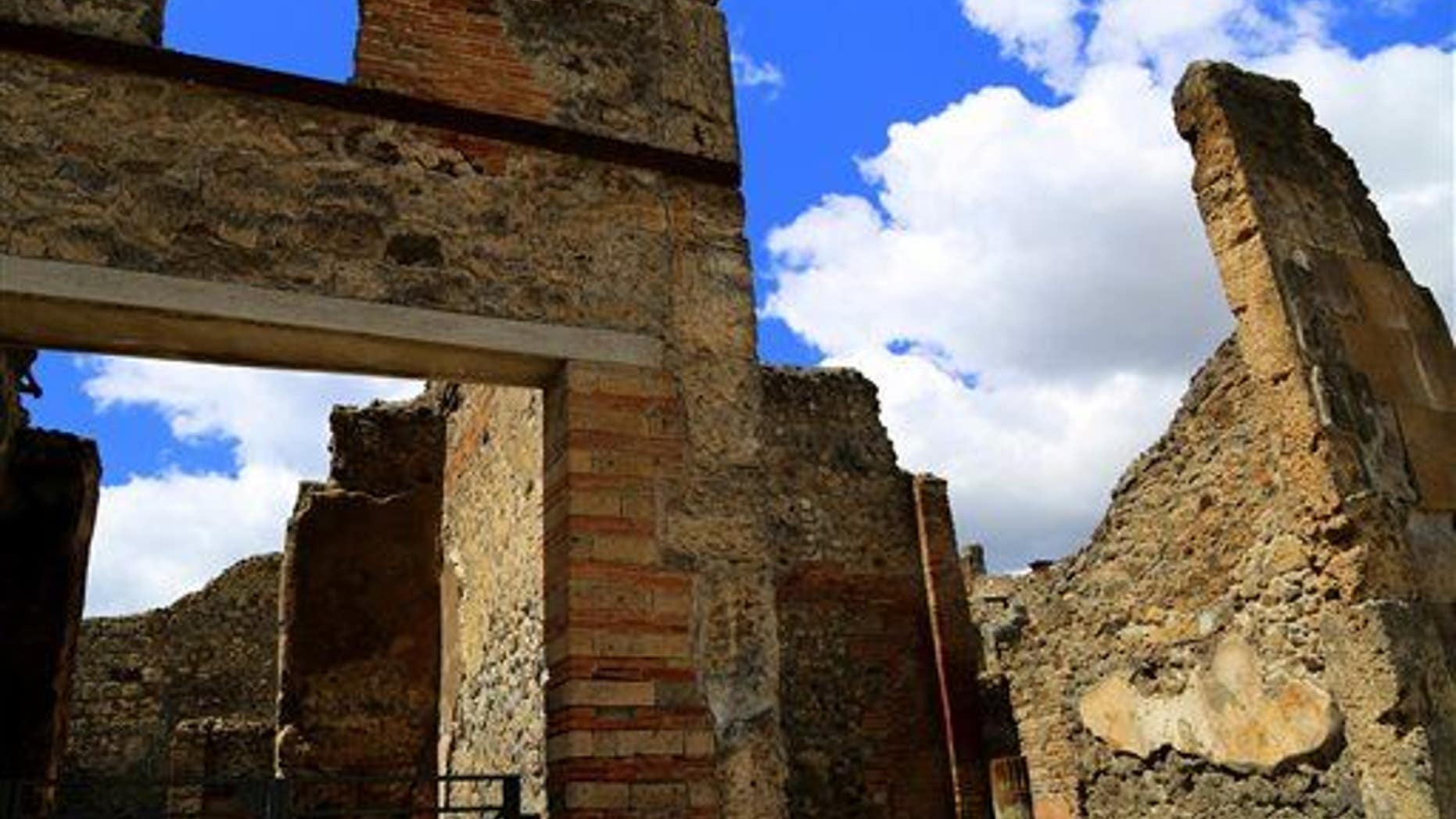In this file photo, the sun shines on ruined walls in Pompeii, near modern-day Naples, Italy.