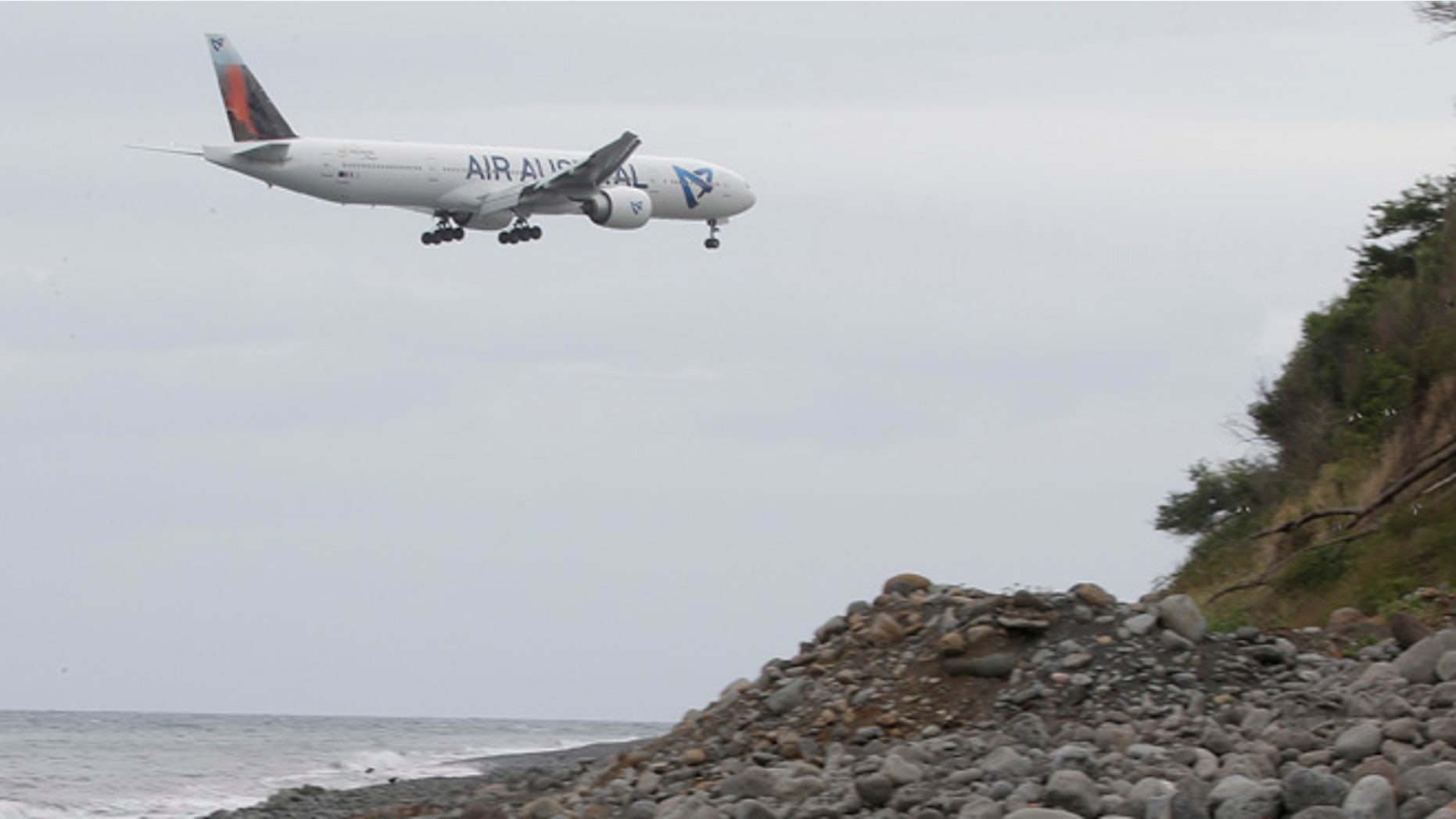Aug. 3: An airplane flies over the Jamaique beach in Saint-Denis on the French Indian Ocean island of La Reunion.