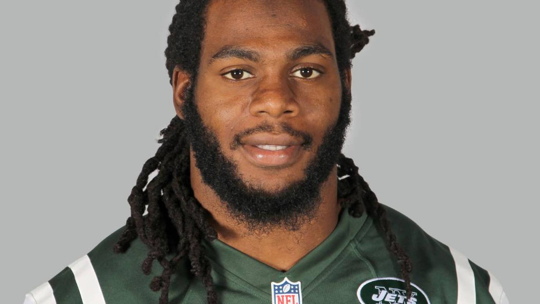 FILE - A June 16, 2014, file photo is of New York Jets linebacker Jermaine Cunningham in Forham Park, N.J. When Cunningham appears in a New Jersey courtroom, he’ll be the most recognizable defendant yet facing charges over “revenge porn.” The case comes amid a national push to punish jilted lovers and others who distribute racy photos often taken before a relationship fell apart. (AP Photo)