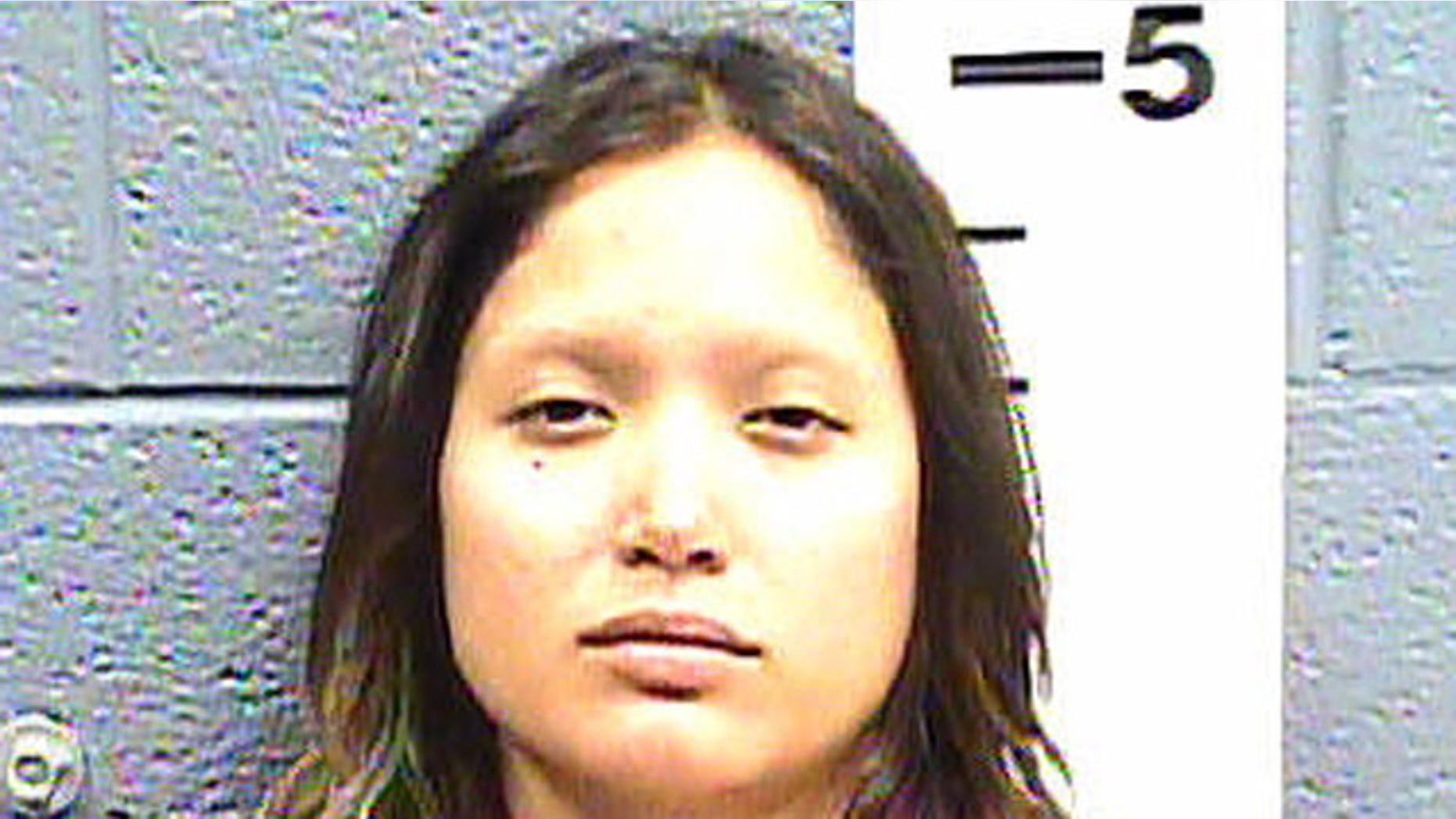 Aurelia Reyes was arrested after grabbing her boyfriend's head and allegedly biting off his lower lip.