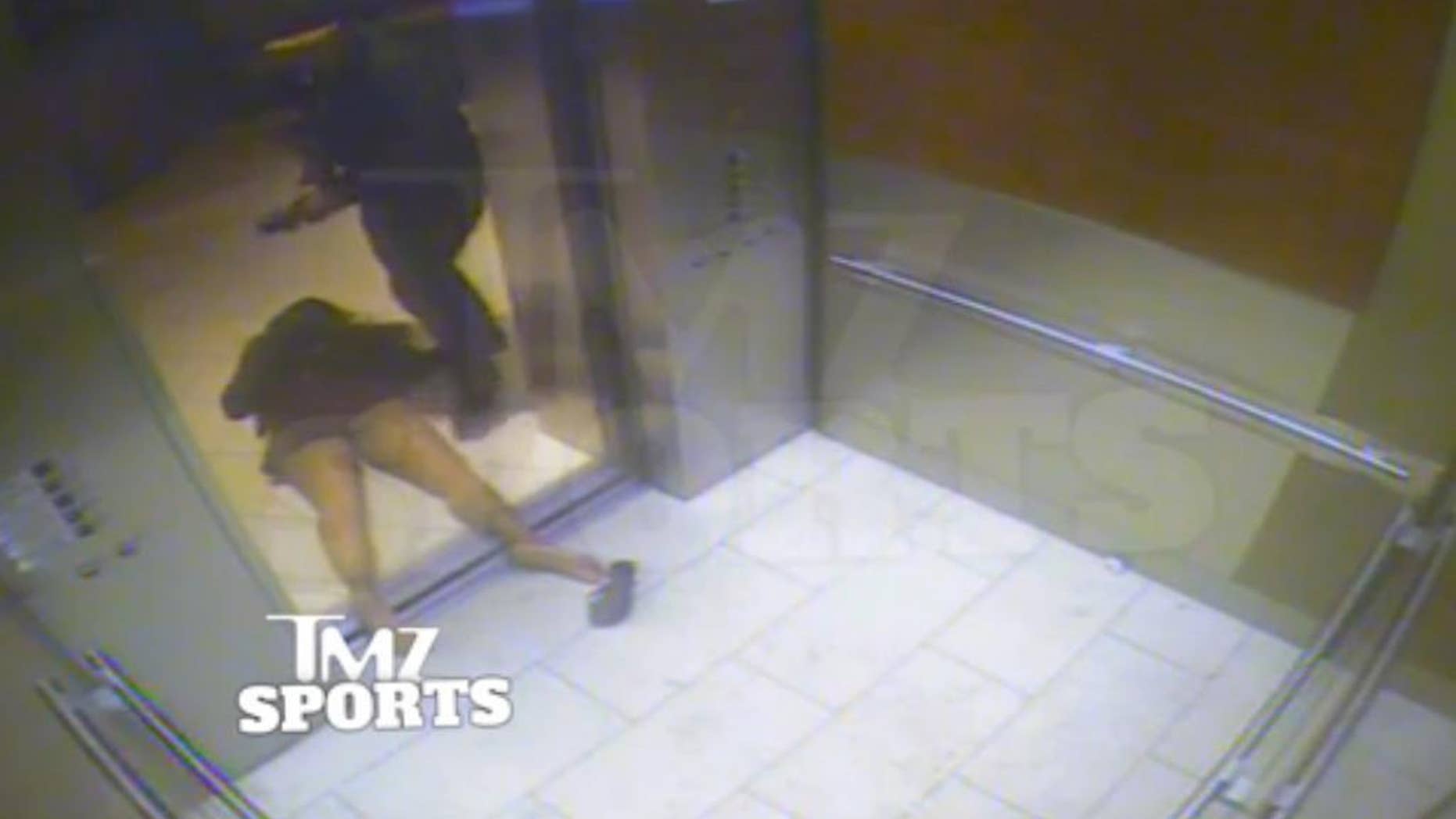 FILE - In this February 2014 file photo, from a still image taken from a hotel security video released by TMZ Sports, Baltimore Ravens running back Ray Rice drags his fiancee, Janay Palmer, out of an elevator moments after knocking her off her feet, against the elevator's railing at the Revel casino in Atlantic City, N.J. A law enforcement official says he sent a video of Ray Rice punching his then-fiancee to an NFL executive five months ago, while league officers have insisted they didn't see the violent images until this week. The person played The Associated Press a 12-second voicemail from an NFL office number on April 9 confirming the video arrived. A female voice expresses thanks and says: "You're right. It's terrible." (AP Photo/File)