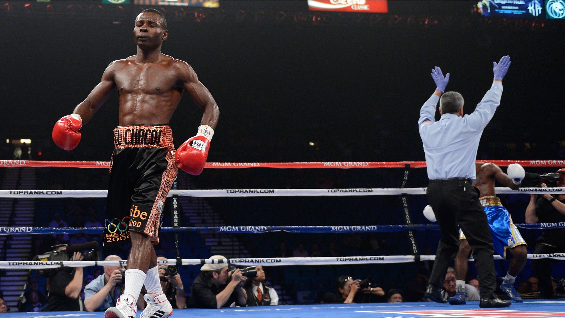 LAS VEGAS, NV - JUNE 09: Guillermo Rigondeaux (L) reacts after knocking out Teon Kennedy during their WBA super bantamweight title fight at MGM Grand Garden Arena on June 9, 2012 in Las Vegas, Nevada. (Photo by Kevork Djansezian/Getty Images)