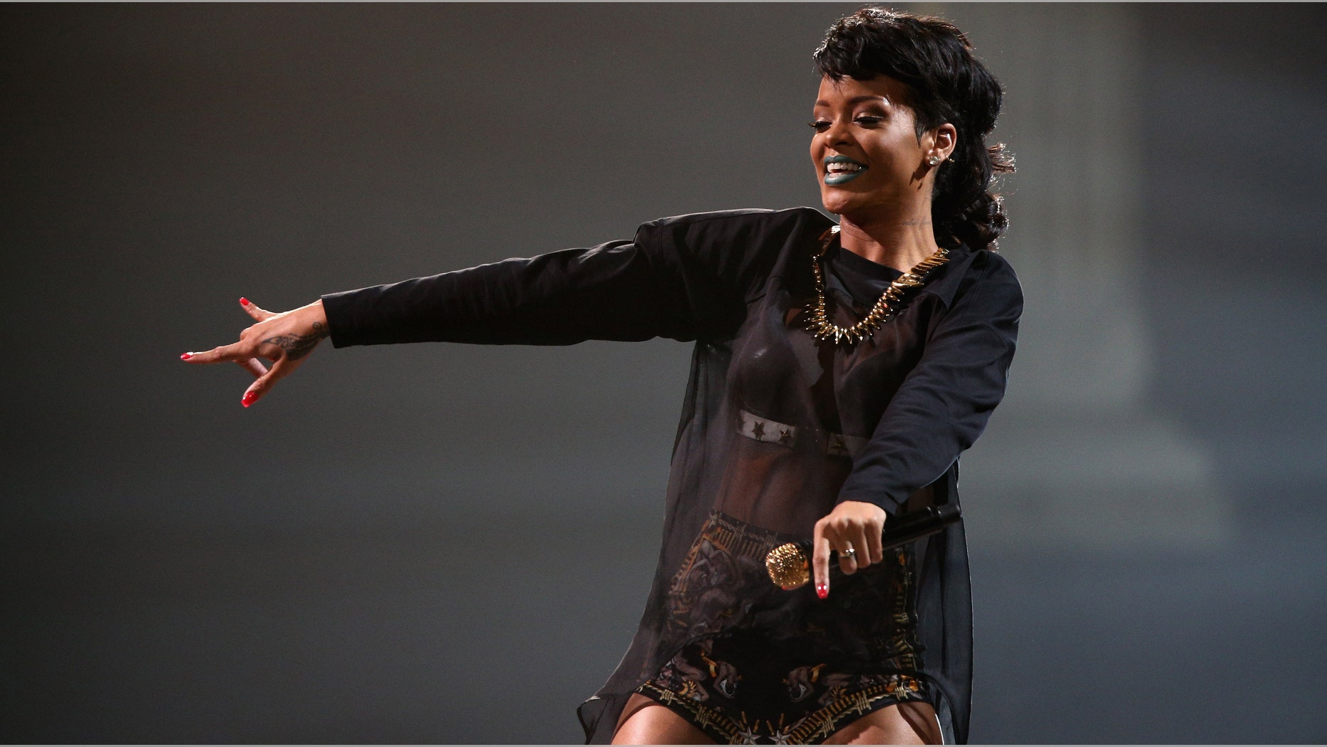Rihanna performs live on stage at Allphones Arena on October 3, 2013 in Sydney, Australia.