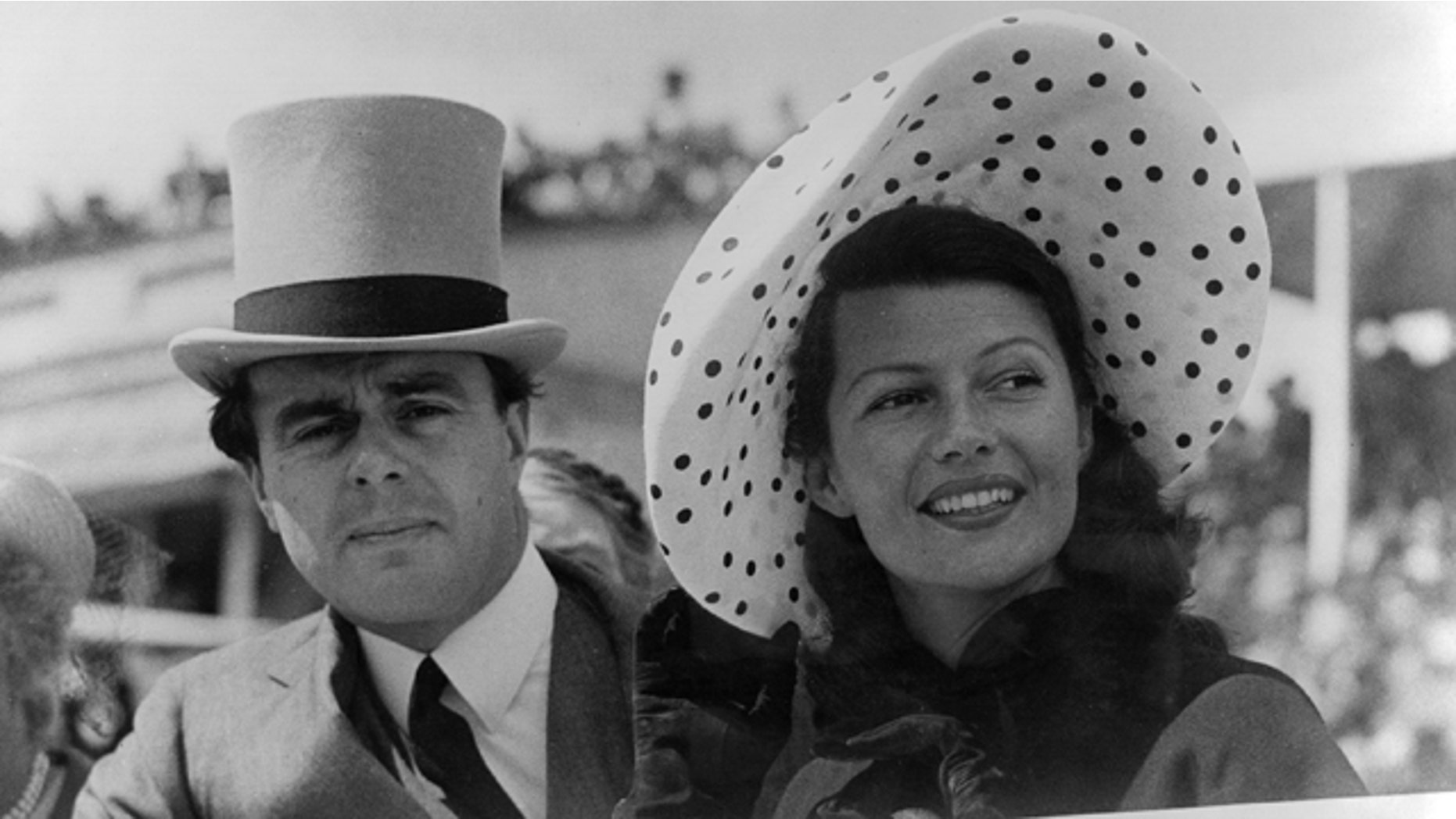 Prince Aly Khan (1911 - 1960) at Epsom races with his wife, Hollywood actress Rita Hayworth (1918 -1987).