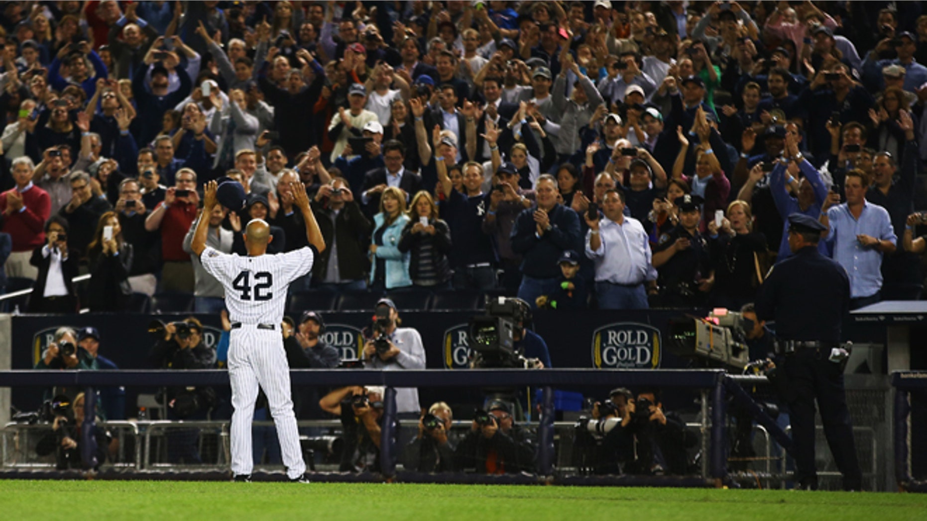 Mariano Rivera waves to the crowd on September 26, 2013 at the Yankee Stadium.