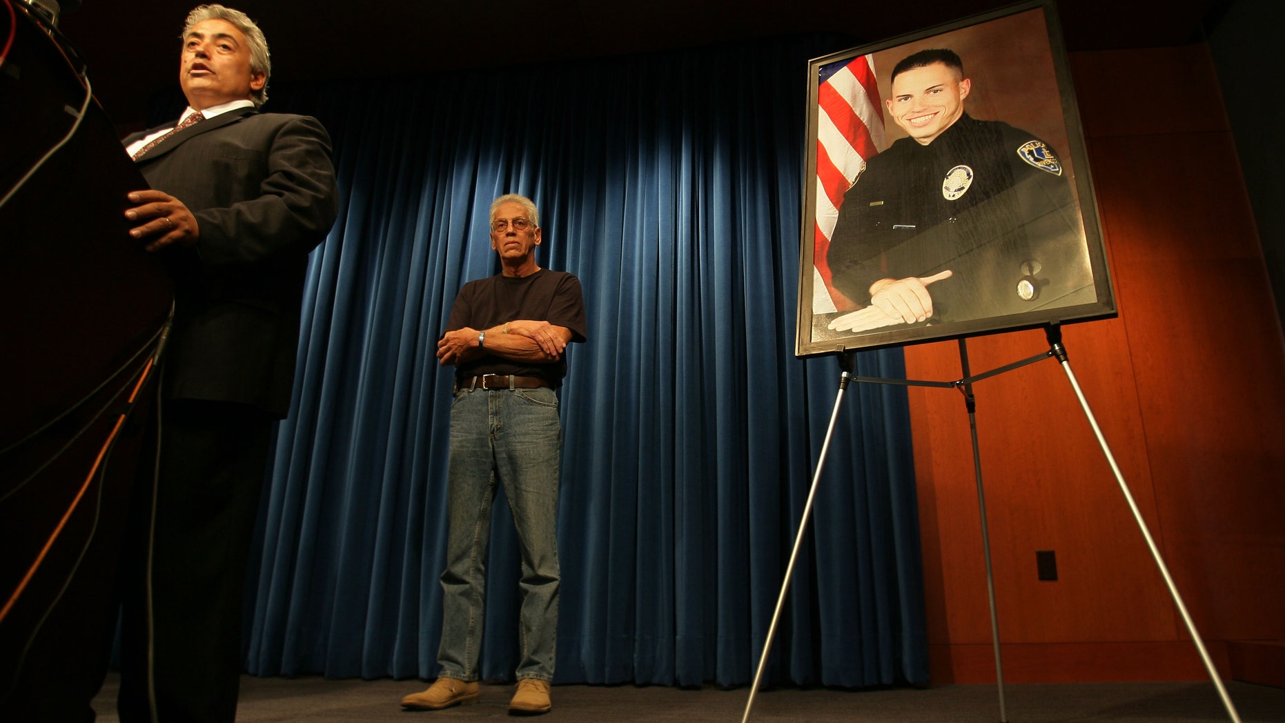 Nov. 15: Riverside County District Attorney Rod Pacheco, announces charges filed against Earl Ellis Green for the murder of Riverside Police Officer Ryan Bonaminio, pictured at right, during a news conference Riverside, Calif.