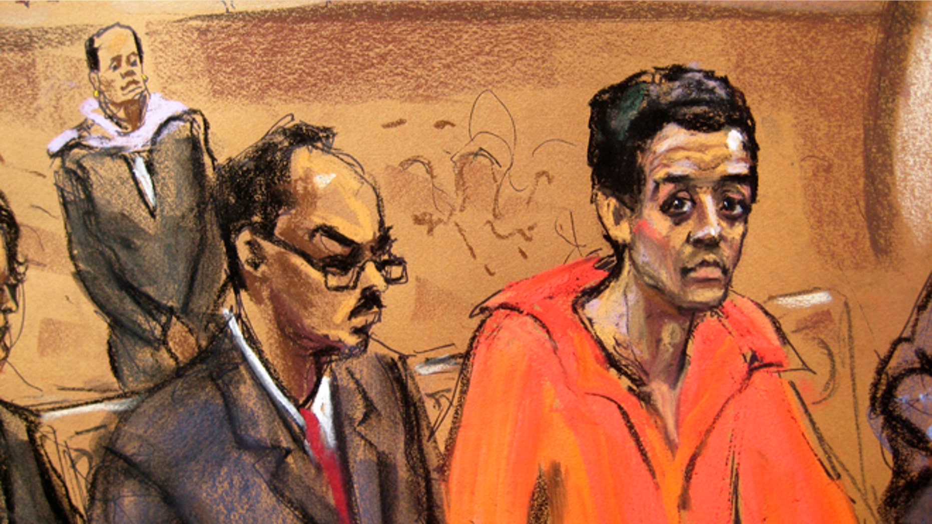 Robel Phillipos (R), the teenager accused of lying to FBI agents in the Boston Marathon bombing investigation, appears in court in Boston, Massachusetts in this May 6, 2013 court sketch.