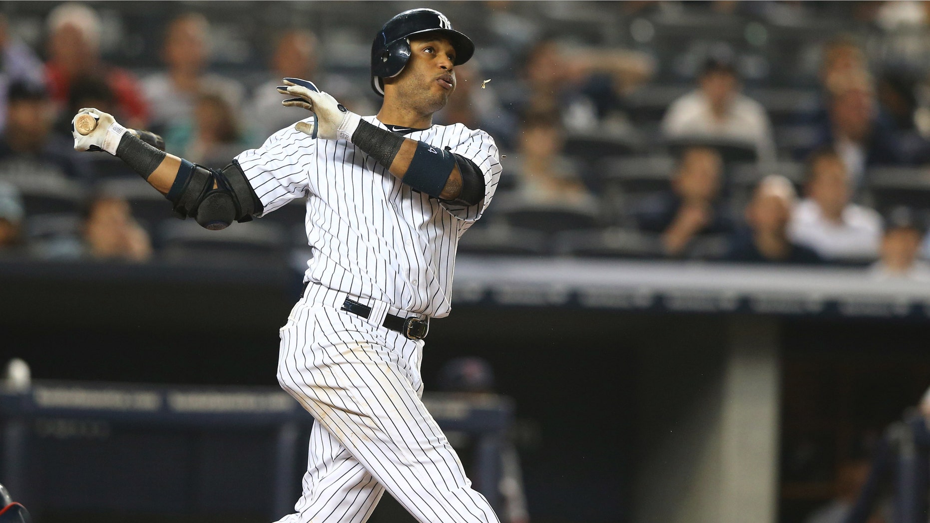 NEW YORK, NY - OCTOBER 03: Robinson Cano #24 of the New York Yankees hits a two run home run against the Boston Red Sox during the fourth inning of their game on October 3, 2012 at Yankee Stadium in the Bronx borough of New York City (Photo by Al Bello/Getty Images)
