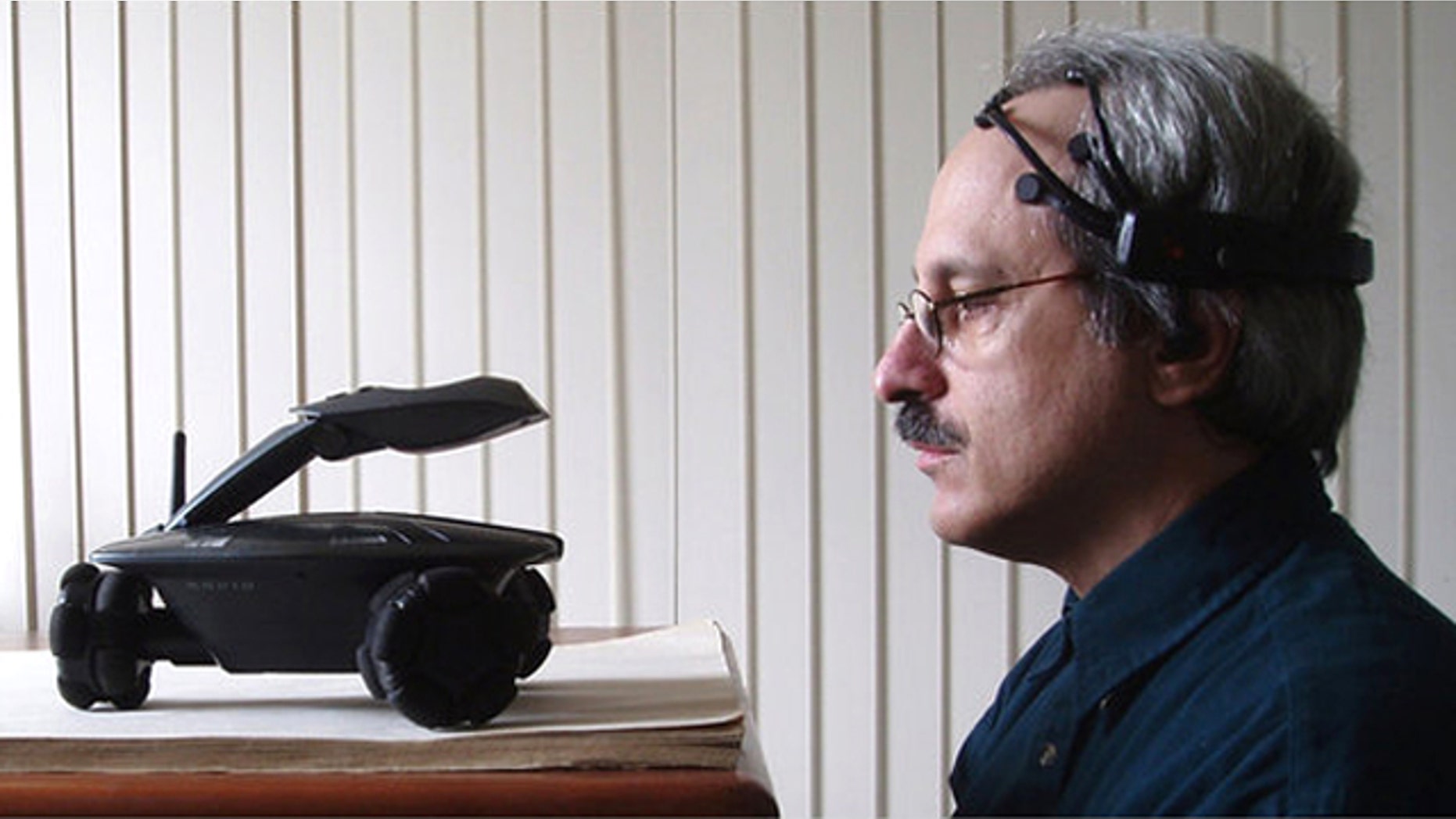 Inventor Robert Oschler wears a kit made of off-the-shelf parts that he says could help a disabled person interact with the physical world.