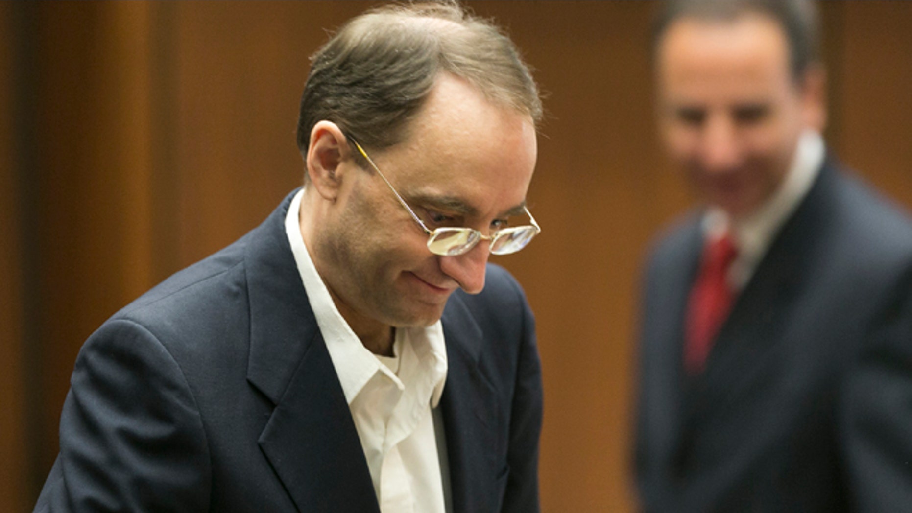 April 8: Christian Karl Gerhartsreiter, left, arrives to his trial at Clara Shortridge Foltz Criminal Justice Center in Los Angeles.
