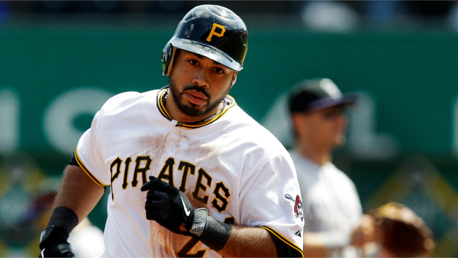 Pittsburgh Pirates' Pedro Alvarez rounds third after hitting a solo-home run off Colorado Rockies pitcher Juan Nicasio in the seventh inning of a baseball game in Pittsburgh, Wednesday, April 25, 2012. The Rockies won the first game of a double header 2-1. (AP Photo/Gene J. Puskar)