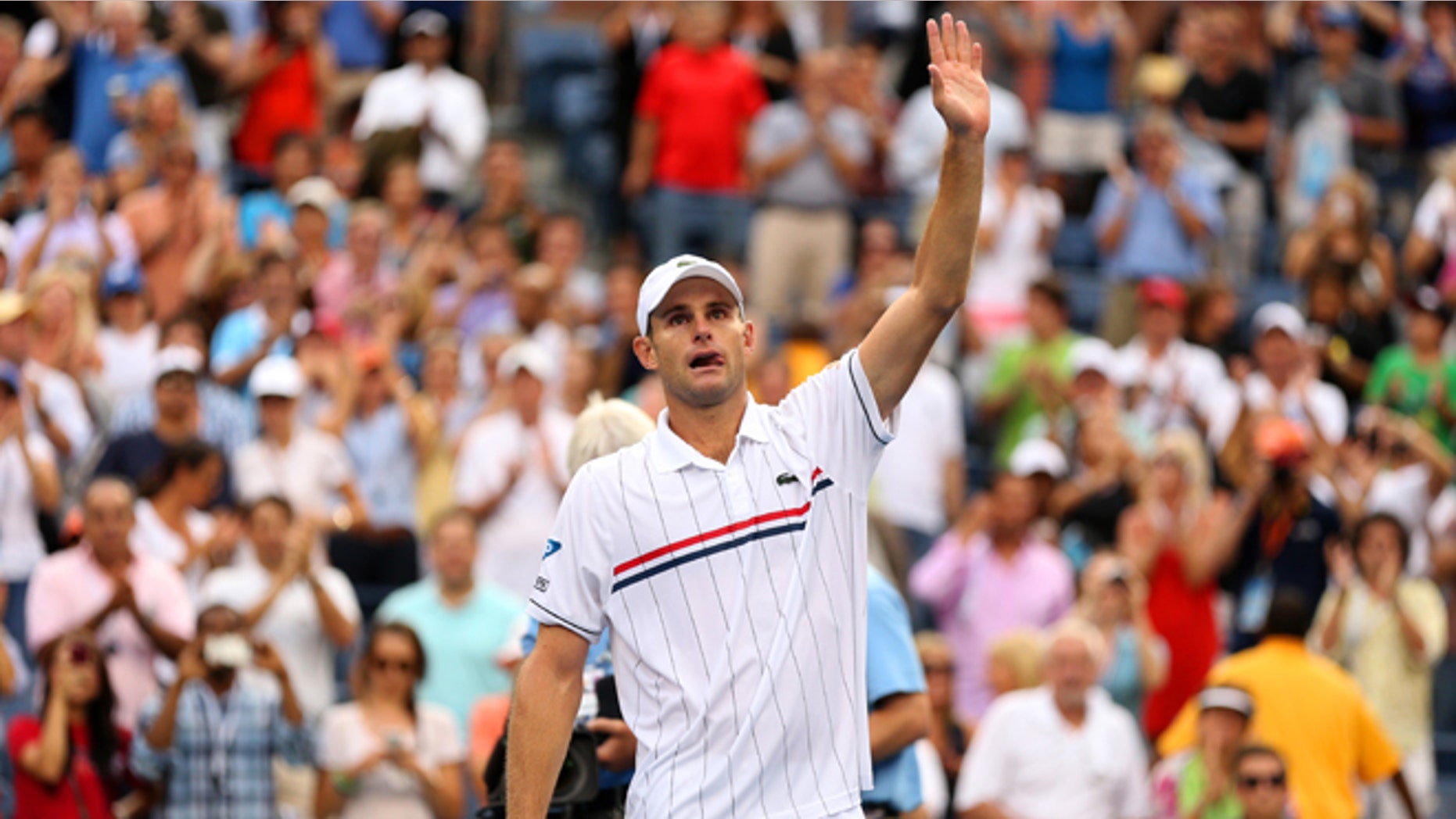 NEW YORK, NY - SEPTEMBER 05: Andy Roddick of the United States waves to the crowd after losing to Juan Martin Del Potro of Argentina after their men's singles fourth round match on Day Ten of the 2012 US Open at USTA Billie Jean King National Tennis Center on September 5, 2012 in the Flushing neighborhood of the Queens borough of New York City. (Photo by Matthew Stockman/Getty Images)