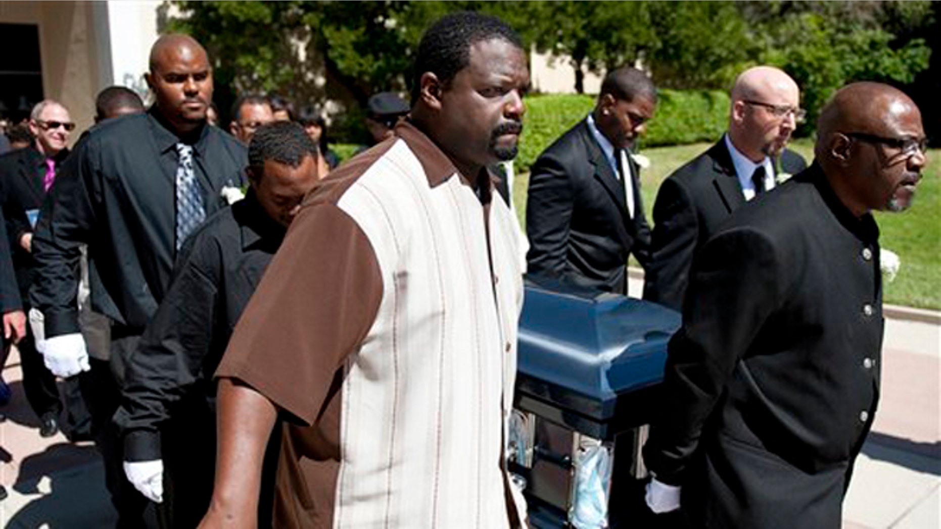 June 30, 2012: Rodney King's casket is carried out of the Hall of Liberty at Forest Lawn-Hollywood Hills, in Los Angeles after a memorial service.