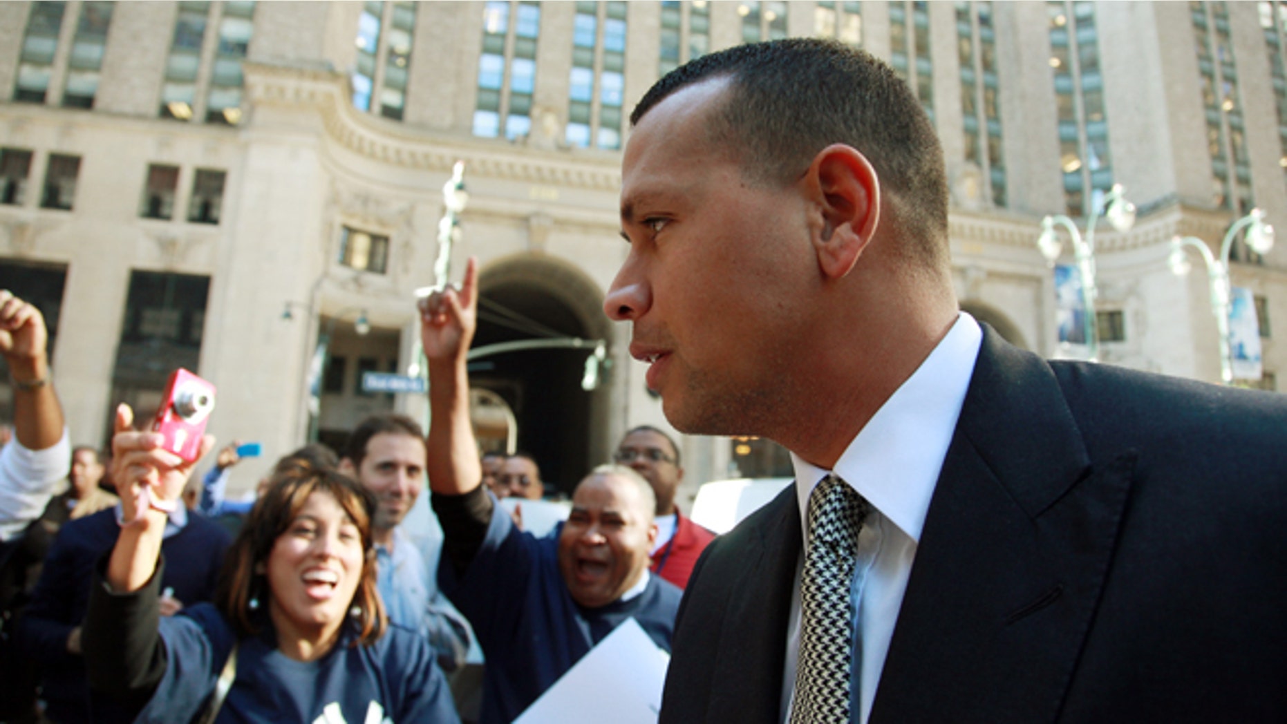 FILE - Tuesday, Oct. 1, 2013 file photo, New York Yankees' Alex Rodriguez arrives at the offices of Major League Baseball, in New York. Rodriguez was back at Major League Baseball's office Monday, Nov. 18, 2013 for the resumption of the grievance hearing to overturn his 211-game suspension. Rodriguez was suspended for 211 games by MLB on Aug. 5 for alleged violations of the sport's drug agreement and labor contract, and the players' association filed the grievance to overturn the penalty. (AP Photo/David Karp, File)