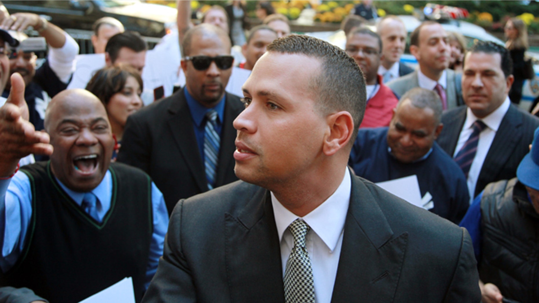 New York Yankees' Alex Rodriguez arrives at the offices of Major League Baseball, Tuesday, Oct. 1, 2013 in New York. The grievance to overturn Rodriguez's 211-game suspension began Monday before arbitrator Fredric Horowitz. (AP Photo/David Karp)
